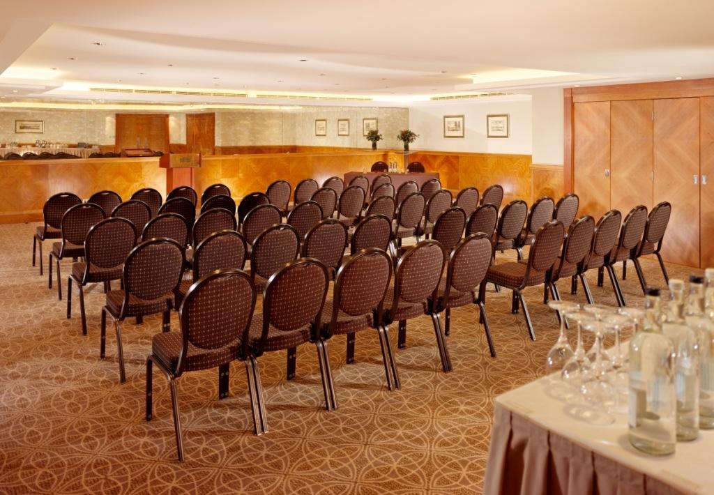 Lancaster Suite meeting room with chairs, ideal for presentations and seminars.