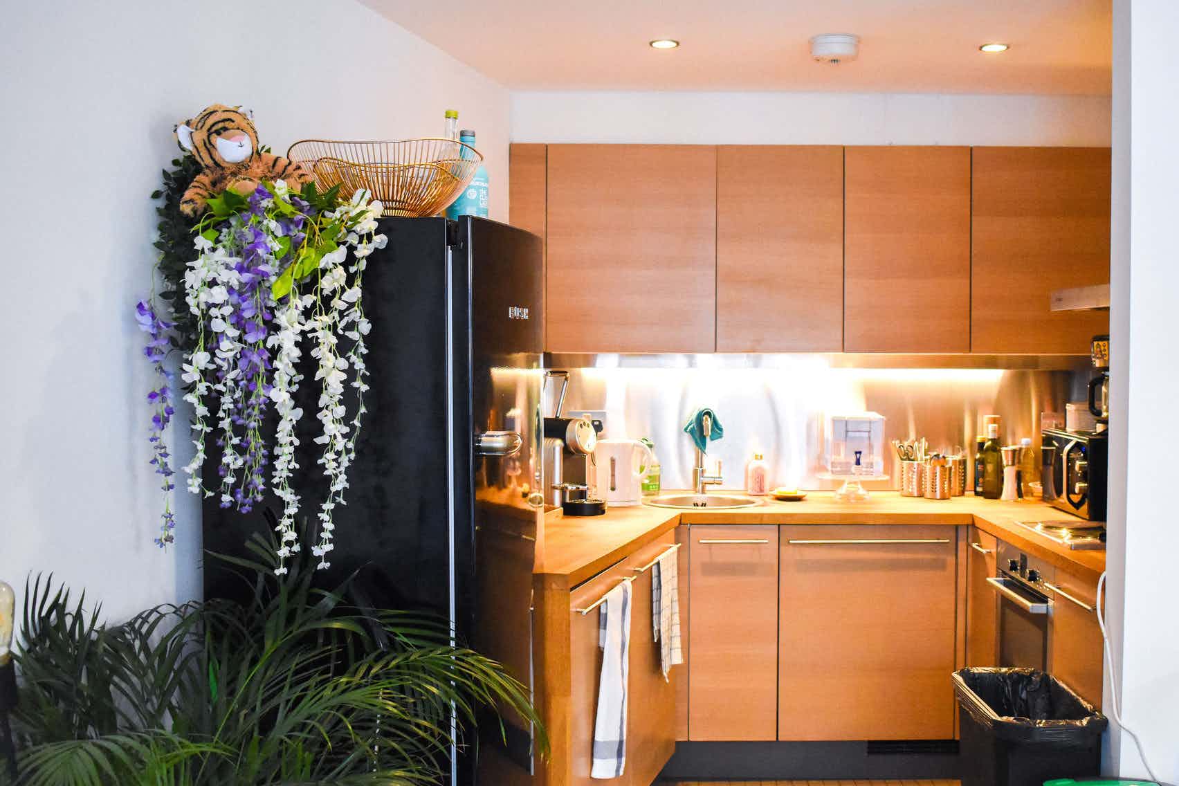 Modern kitchen in Unit A, Blooming Founders, perfect for catering events and networking.