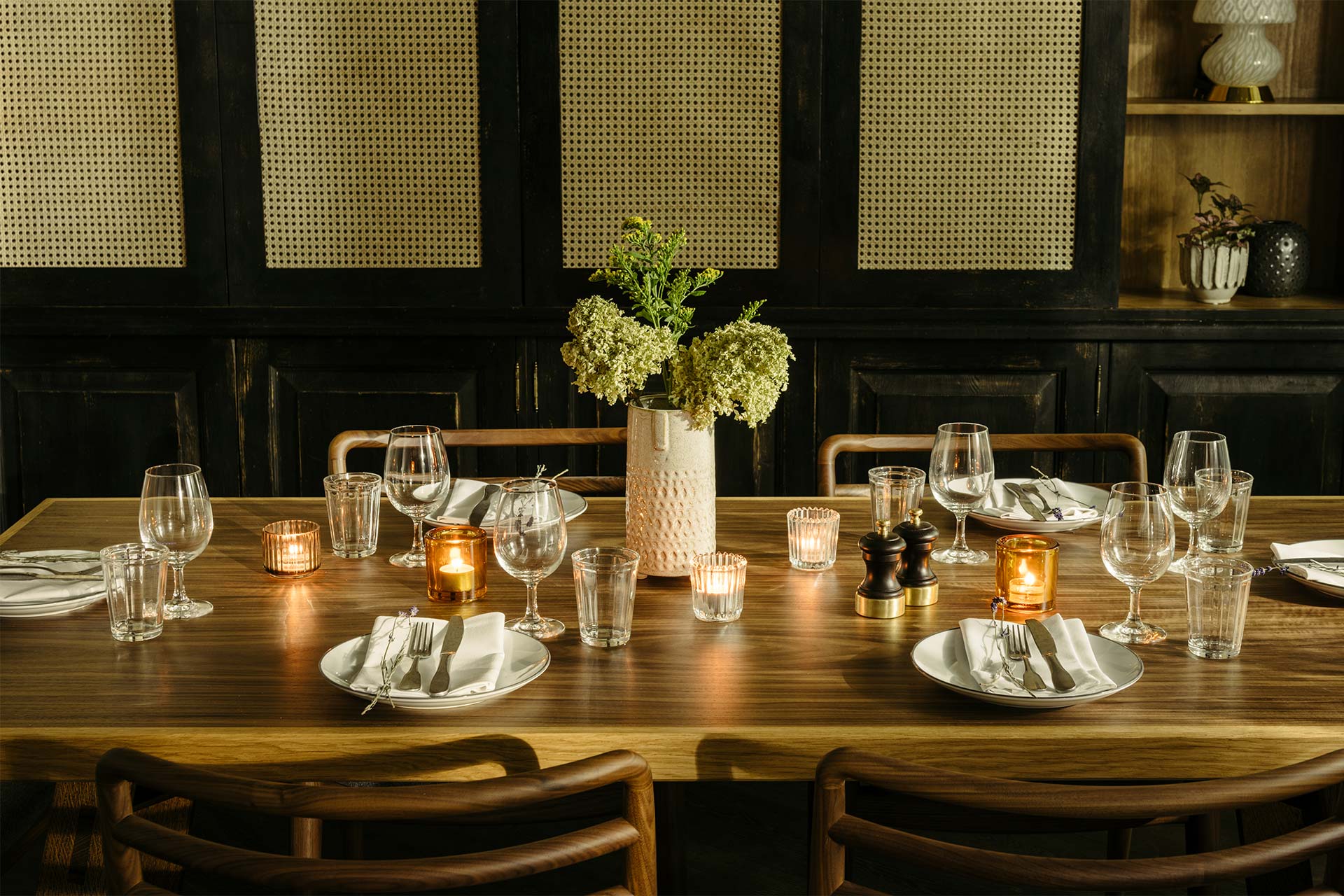 Elegant dining table with floral centerpiece for upscale gatherings in The Hoxton Southwark.