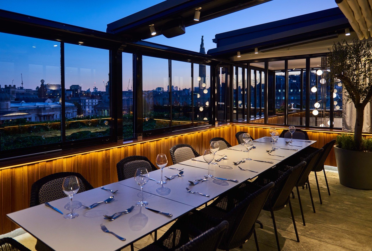 Chic dining space at The Rooftop, ideal for upscale corporate events and celebrations.