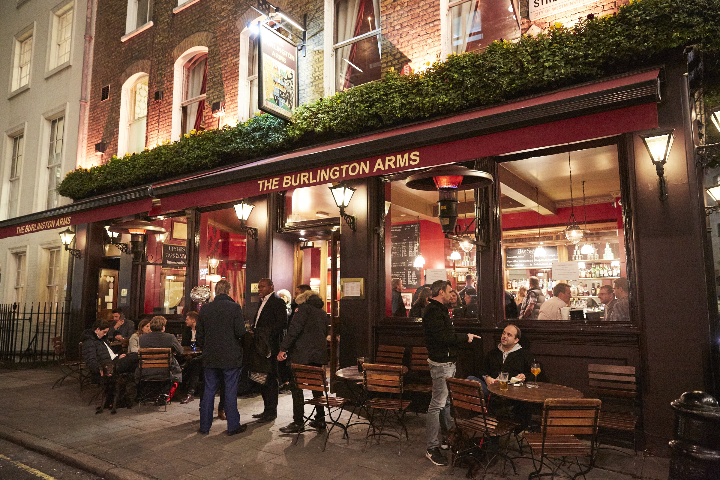 Vibrant Burlington Arms pub with cozy interior, perfect for networking events and gatherings.