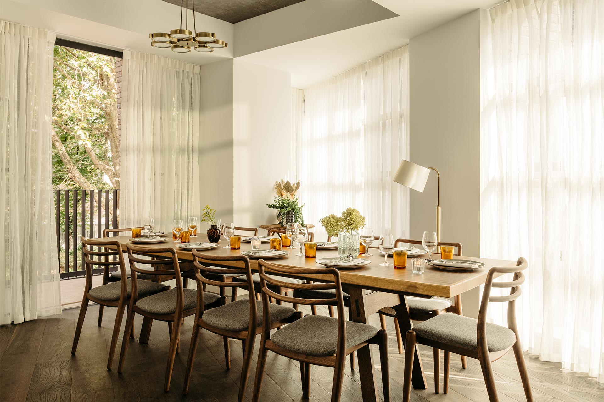 Elegant meeting space with wooden table, ideal for corporate retreats and networking events.