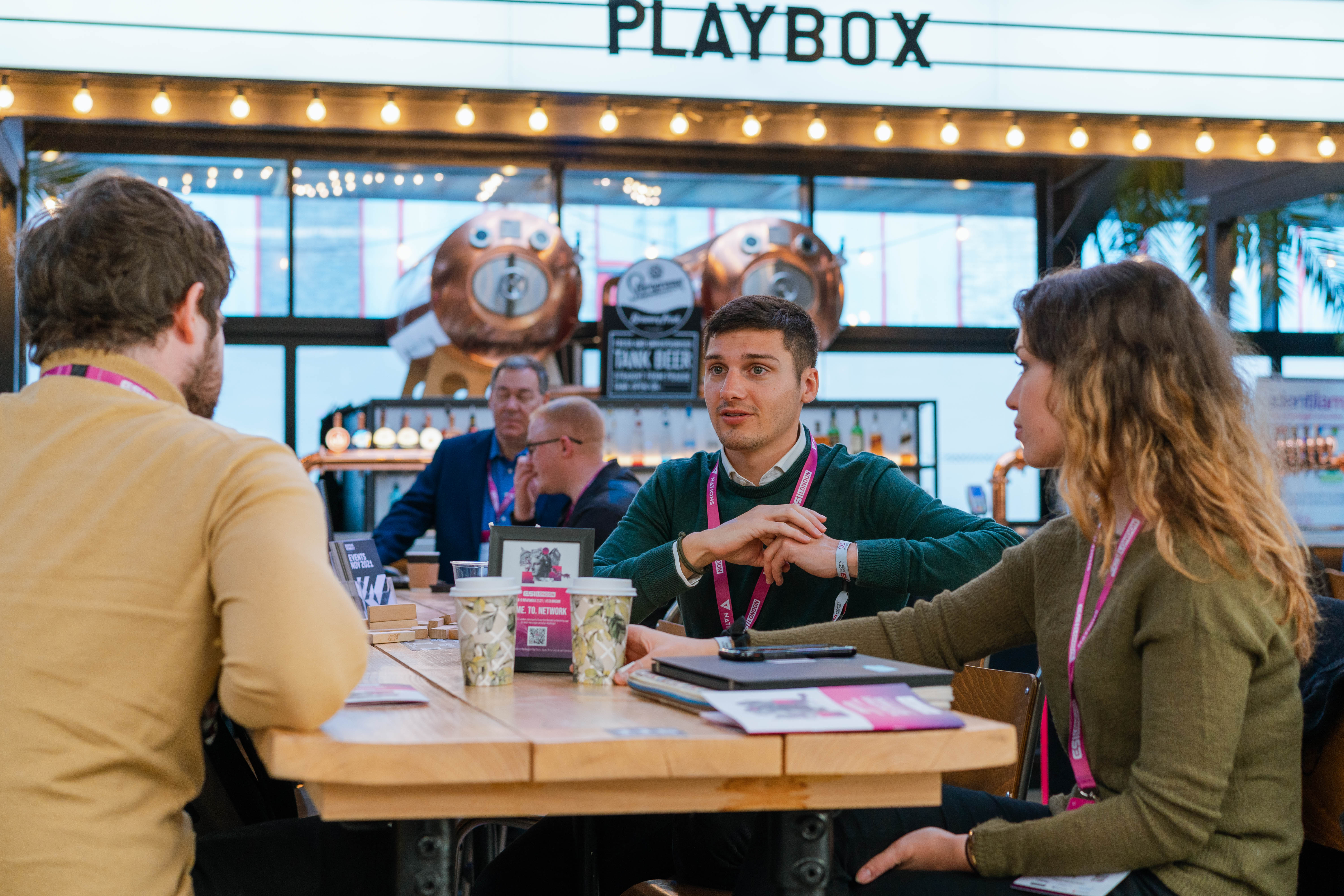 PlayBox Bar at Boxpark Wembley: modern meeting space for networking and collaboration.