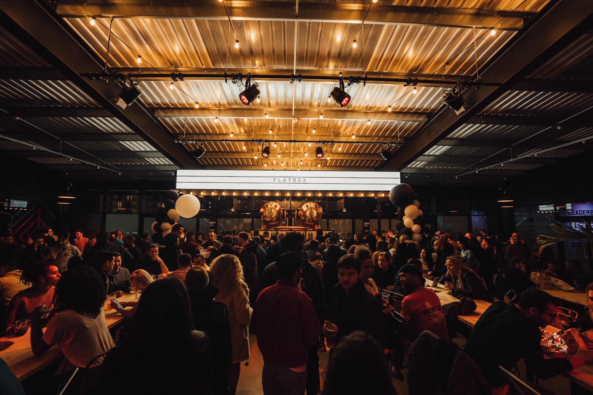 Vibrant PlayBox Bar at Boxpark Wembley, perfect for networking events and social gatherings.
