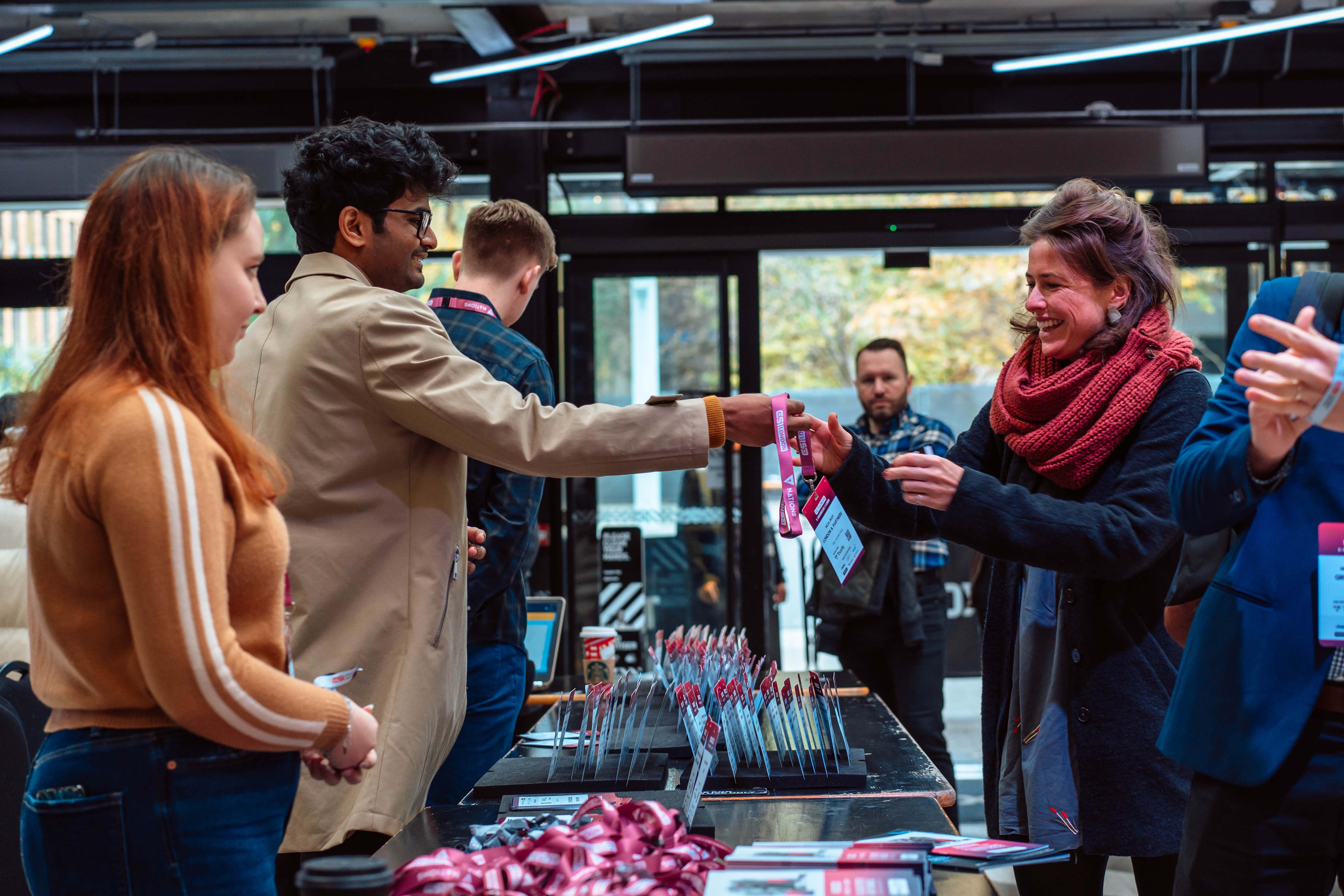 Vibrant registration area at Venue Takeover event in Boxpark Wembley, showcasing excellent service.
