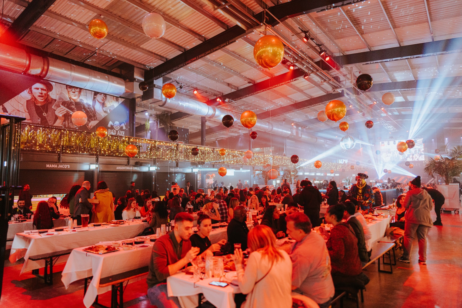 Vibrant Venue Takeover at Boxpark Wembley with festive decor and communal dining.