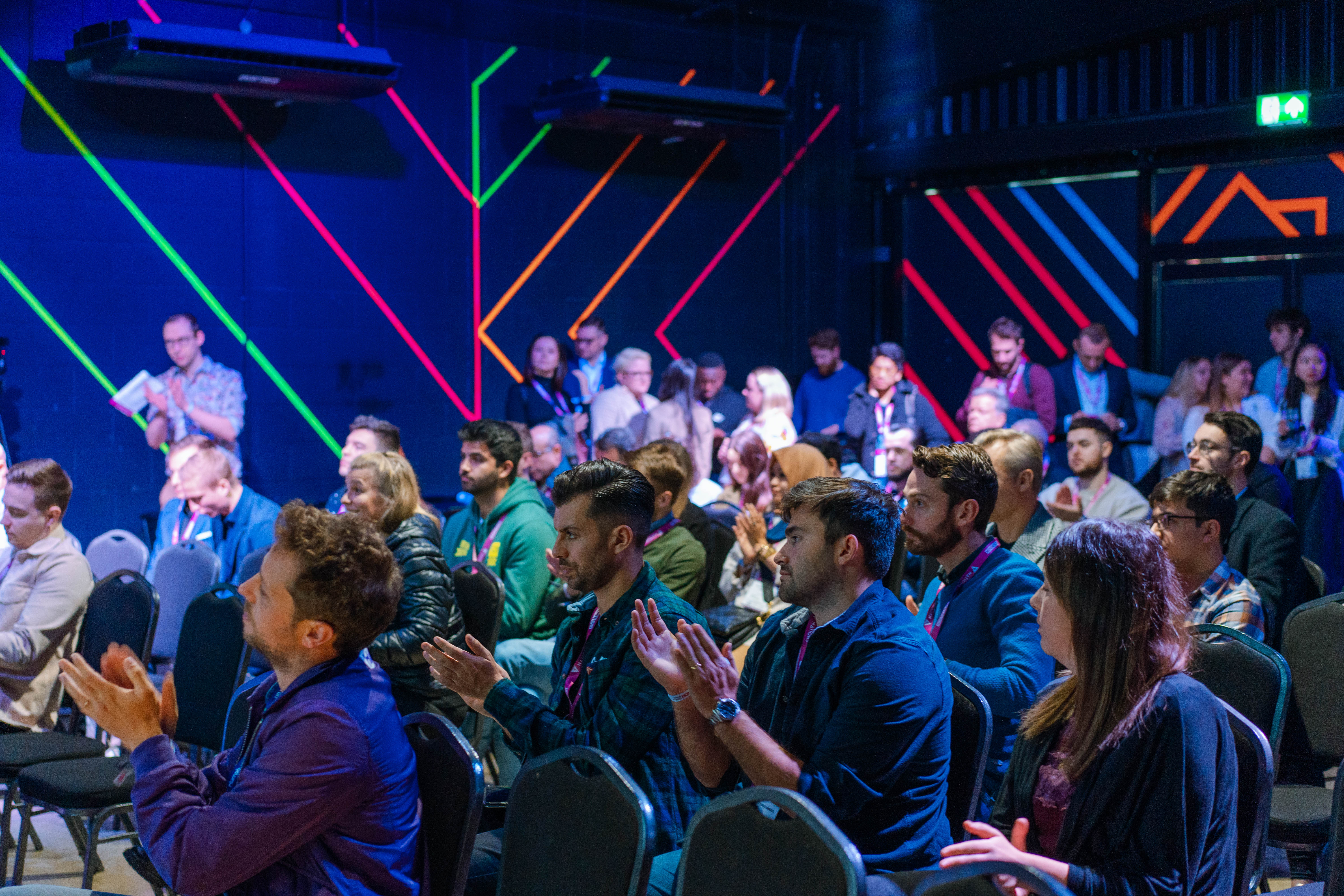 Engaged audience at Playbox Room, Boxpark Wembley for a successful networking event.