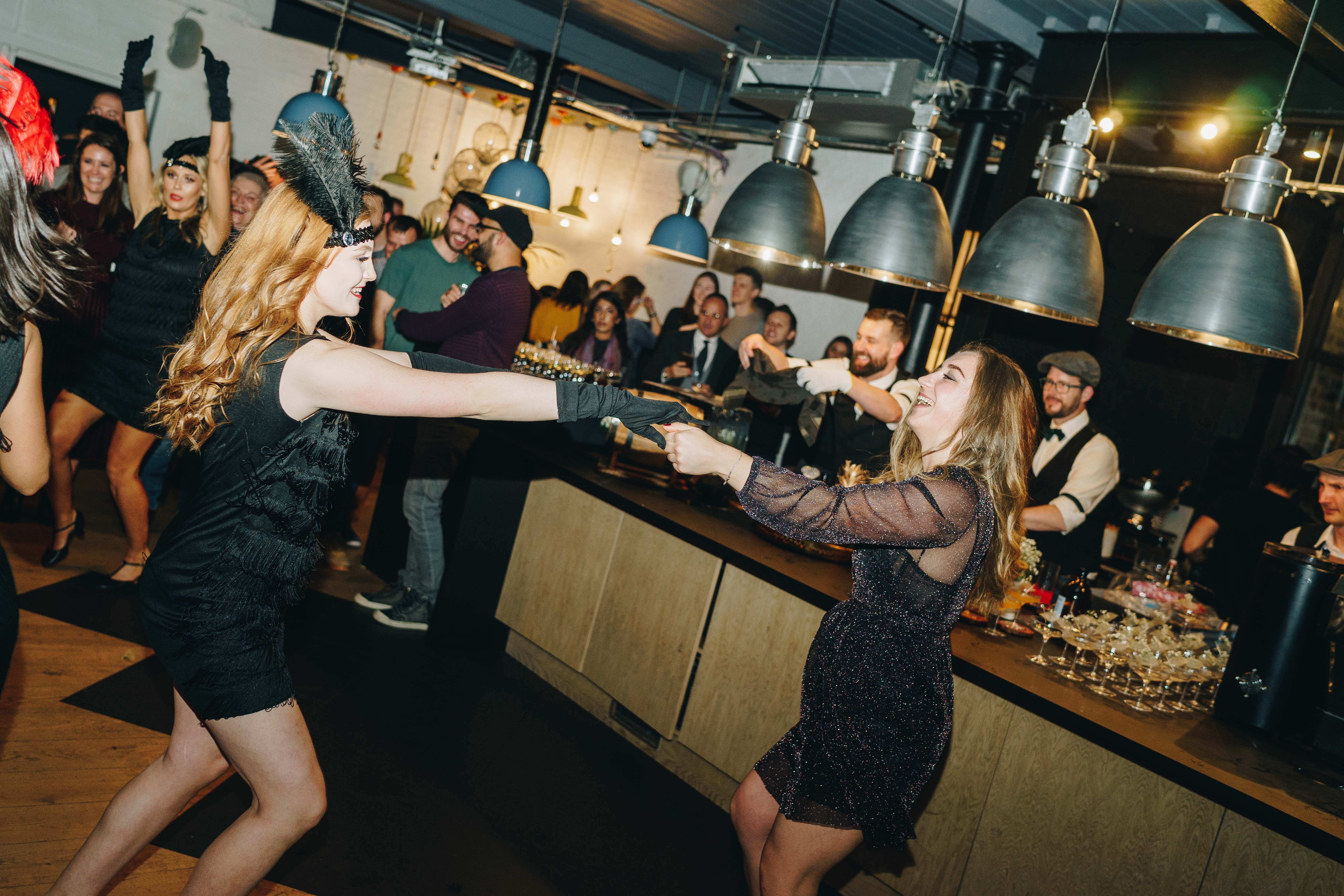 Vibrant event at Cafe Lounge, Highbury & Islington with stylish guests socializing.