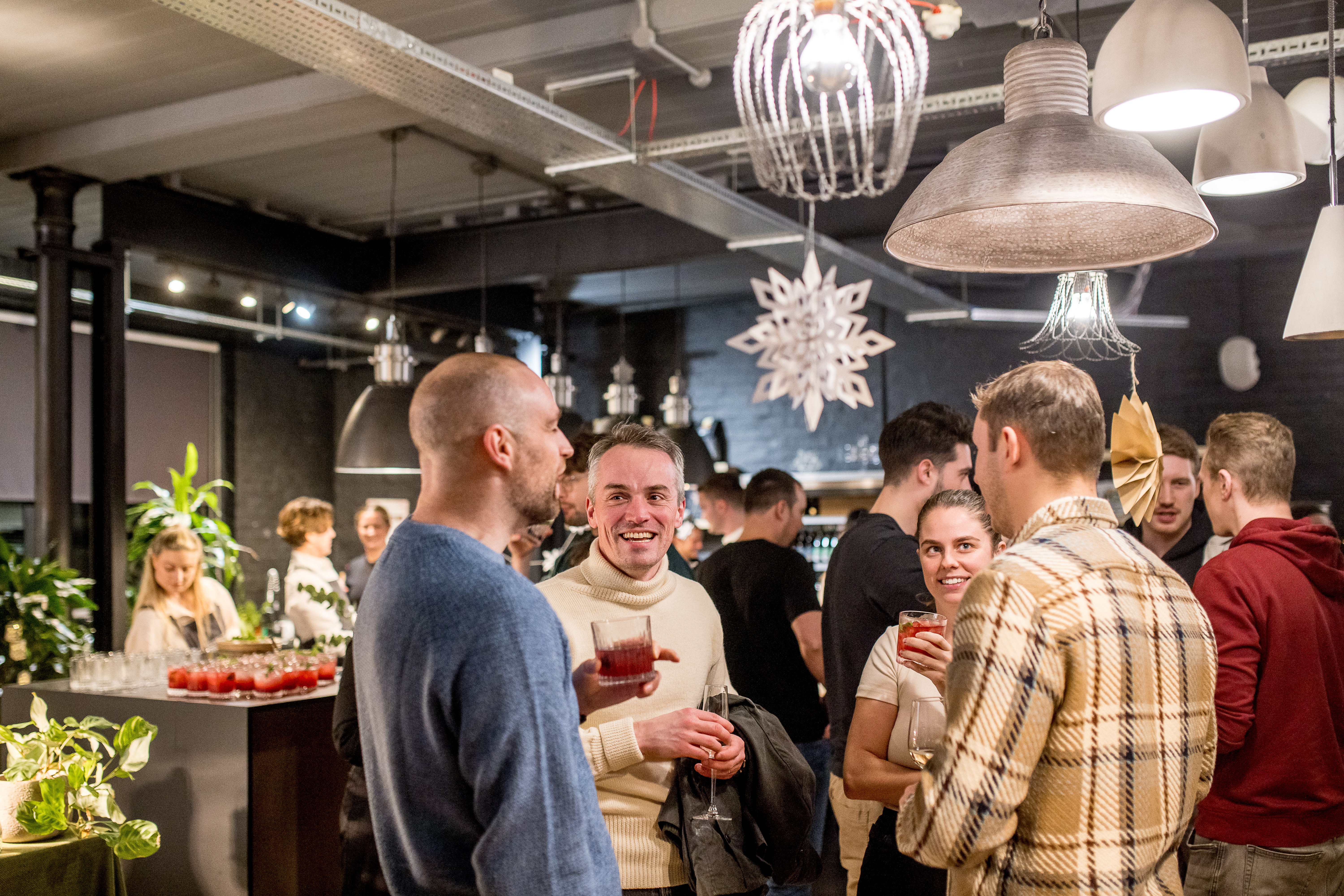 Vibrant networking event at Cafe Lounge, modern decor, professional atmosphere.