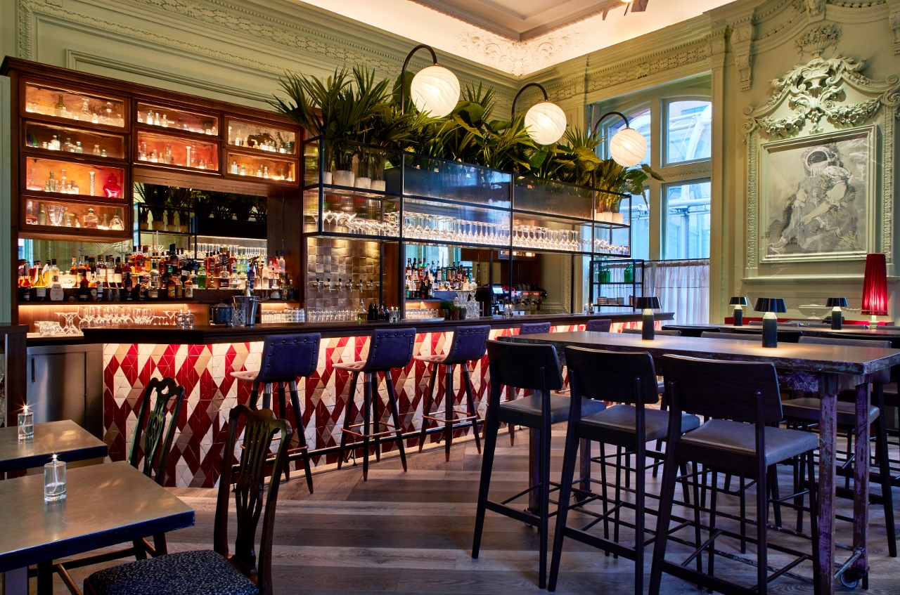 Stylish bar area in Rakes Front Room, ideal for networking events and cocktail receptions.