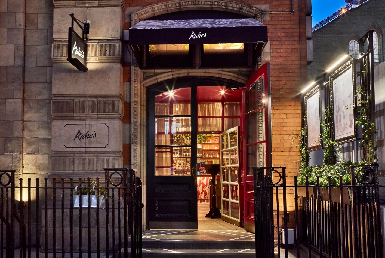 Inviting entrance of Rakes Parlor, stylish venue for corporate events and celebrations.