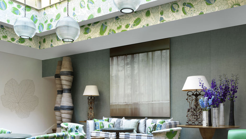 Stylish Rocklin Room at Haymarket Hotel, ideal for meetings and gatherings with vibrant decor.