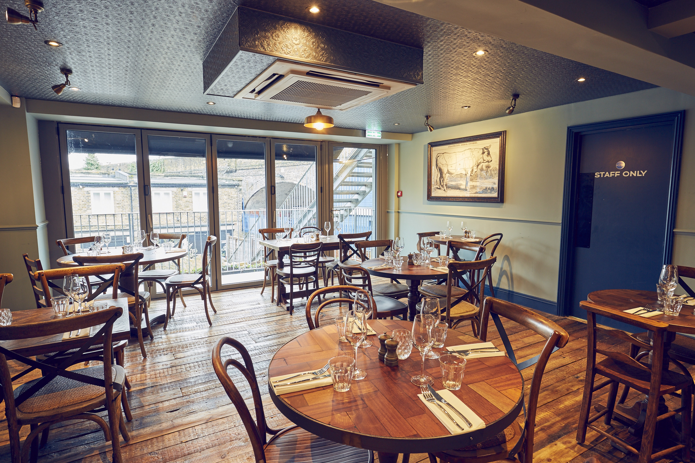 Charming dining space at East Putney Tavern, perfect for intimate gatherings and events.