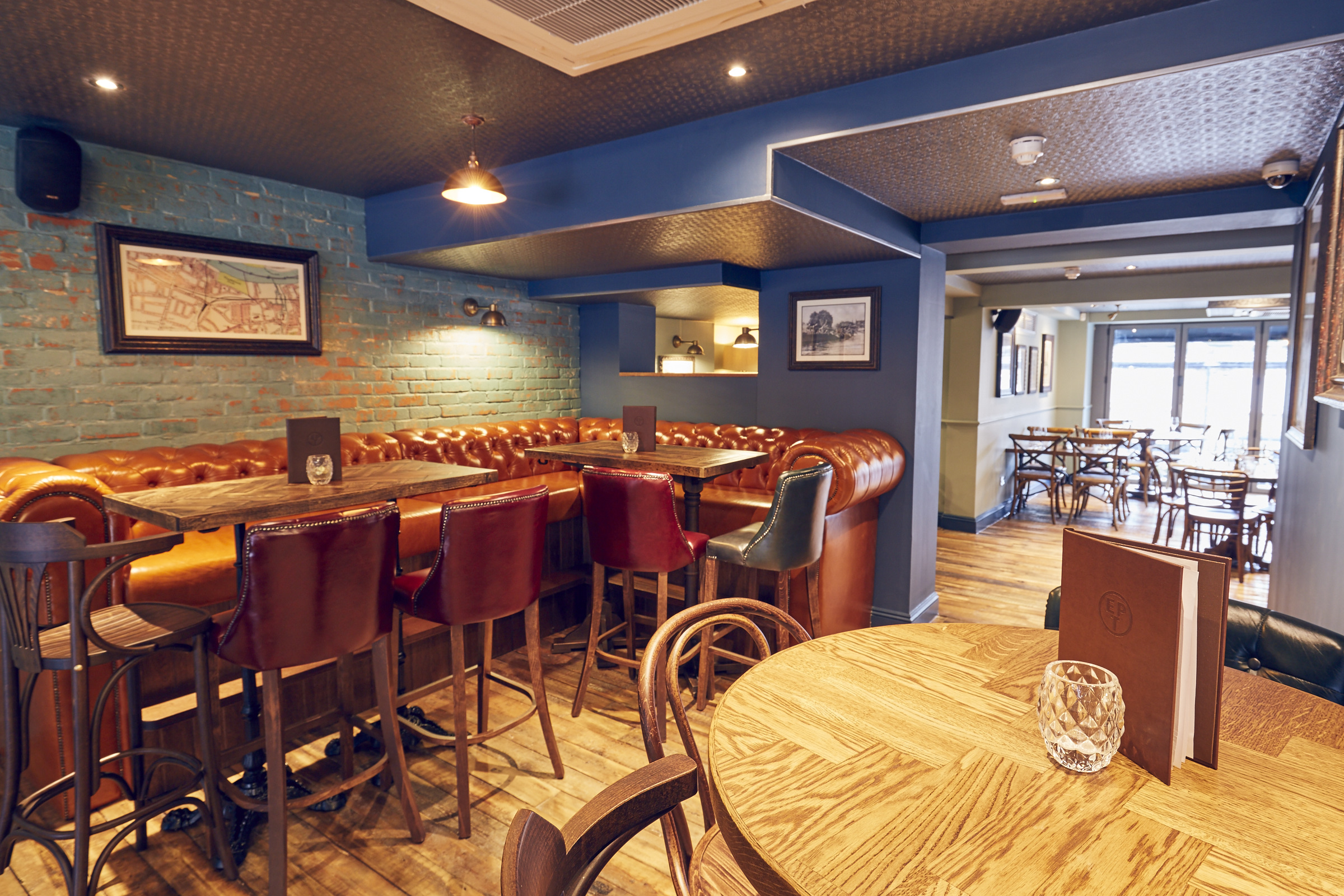 Stylish East Putney Tavern restaurant with warm lighting for networking events.