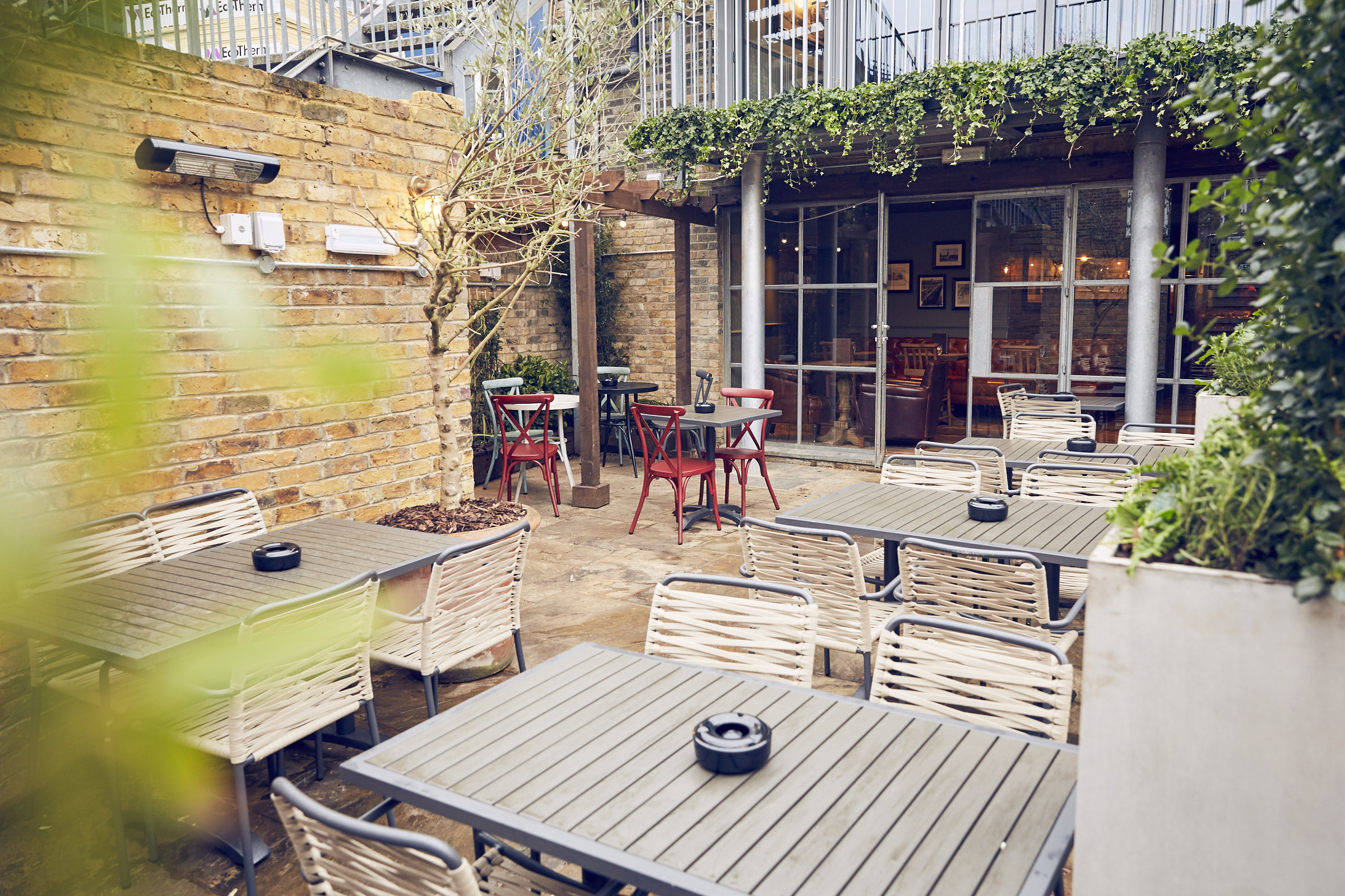 Charming outdoor venue at East Putney Tavern for casual meetings and events.