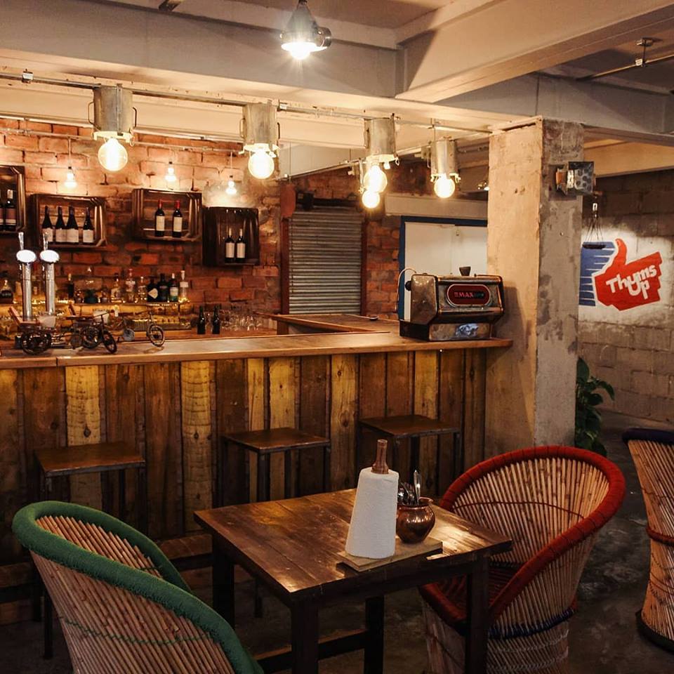 Rustic bar area in Horn Please, ideal for networking events and team-building activities.