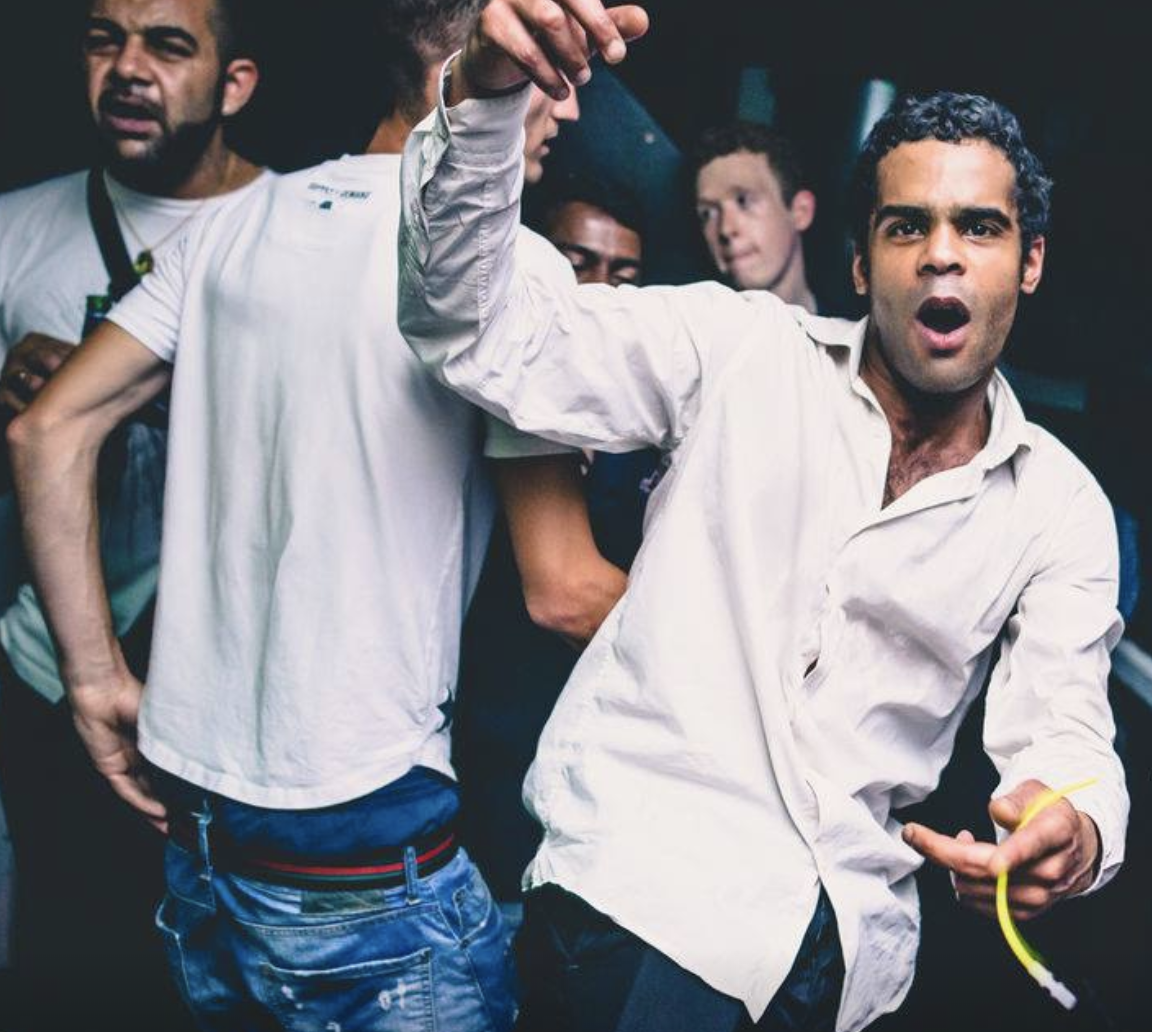 Dance Bar at Bar Rumba featuring vibrant lights and lively atmosphere for nightlife events.