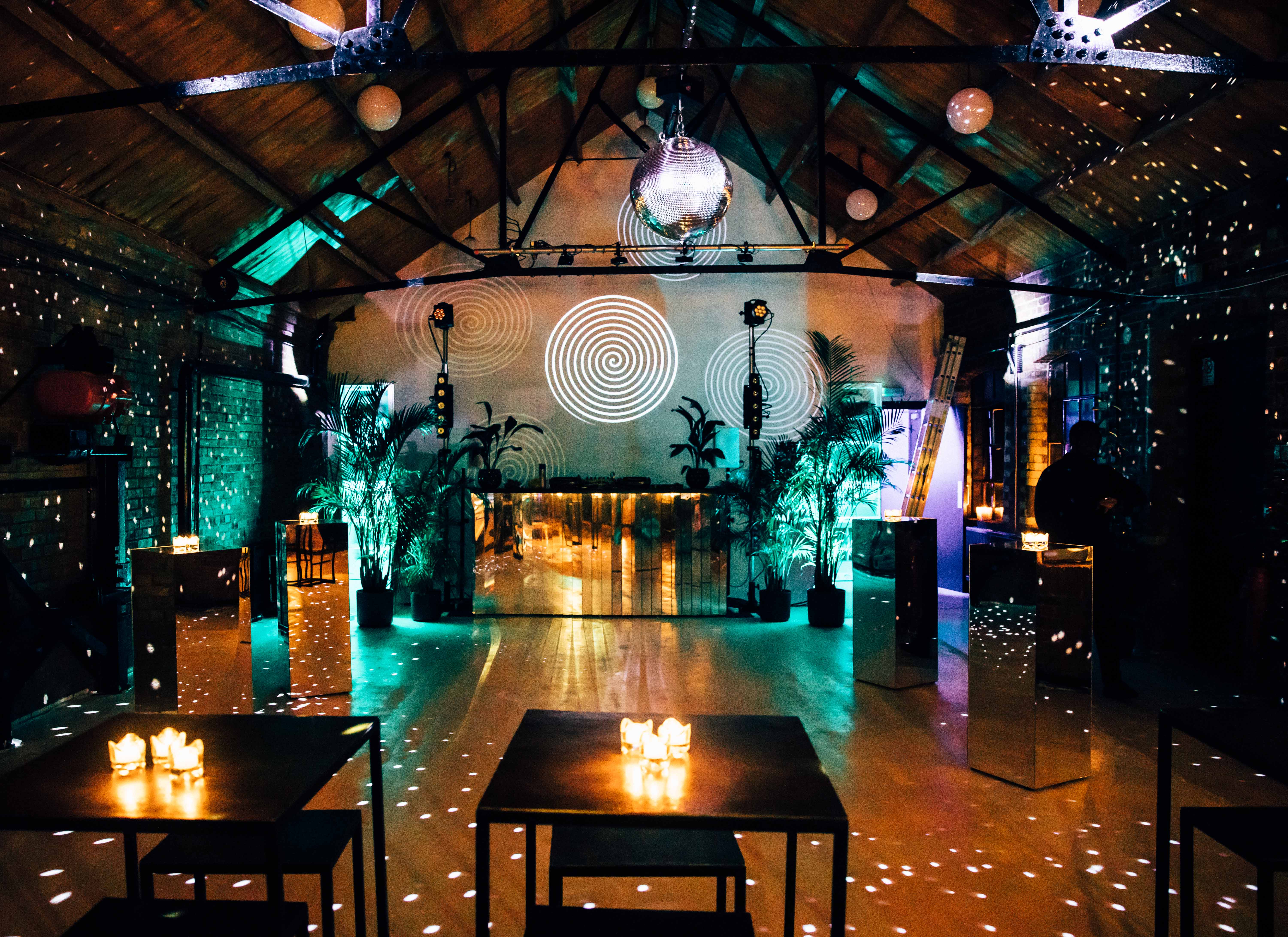 Vibrant Loft Studios event space with dynamic lighting, perfect for parties and gatherings.