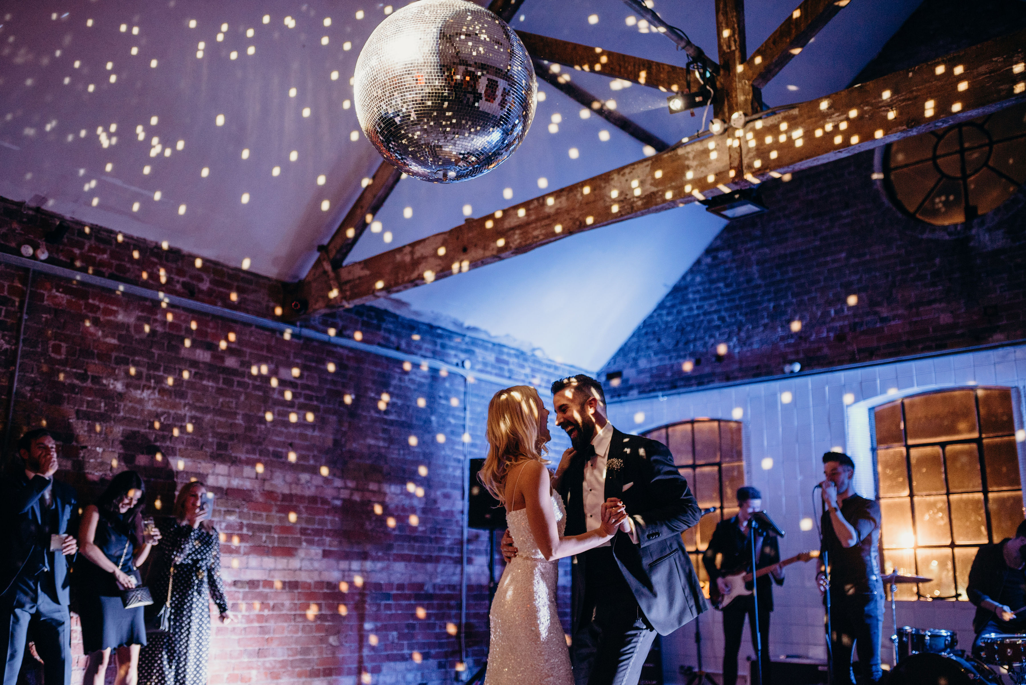 Studio 4 event space with disco ball, ideal for weddings and celebrations.