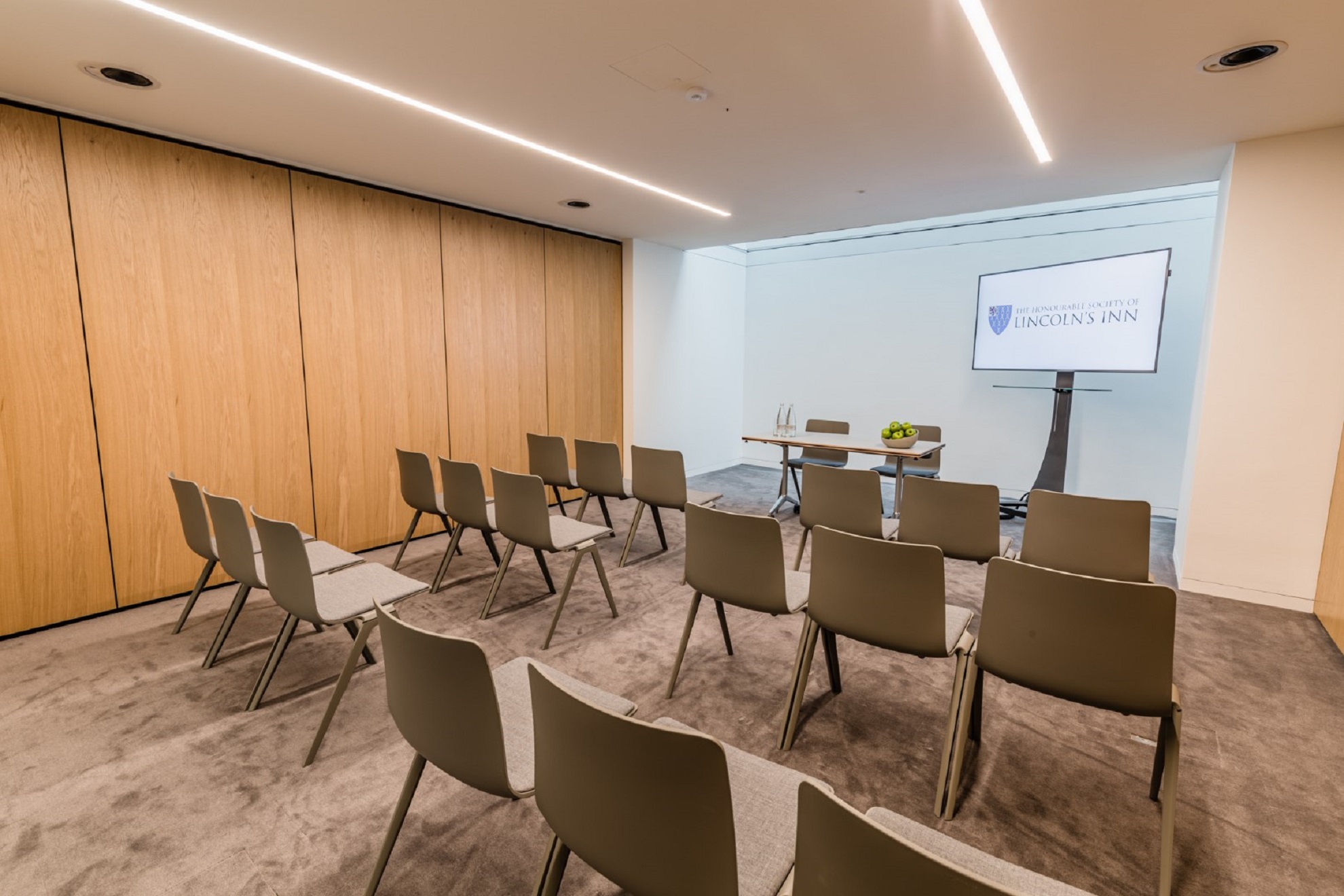 Ashworth Centre meeting space with modern chairs, ideal for presentations and gatherings.
