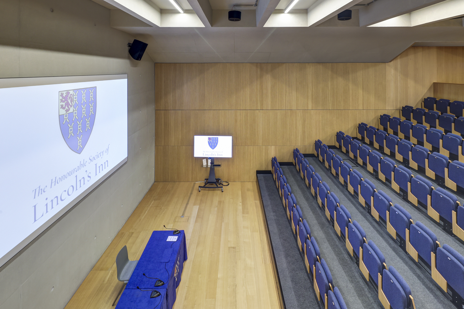 Modern conference room at Ashworth Centre with tiered seating for impactful presentations.