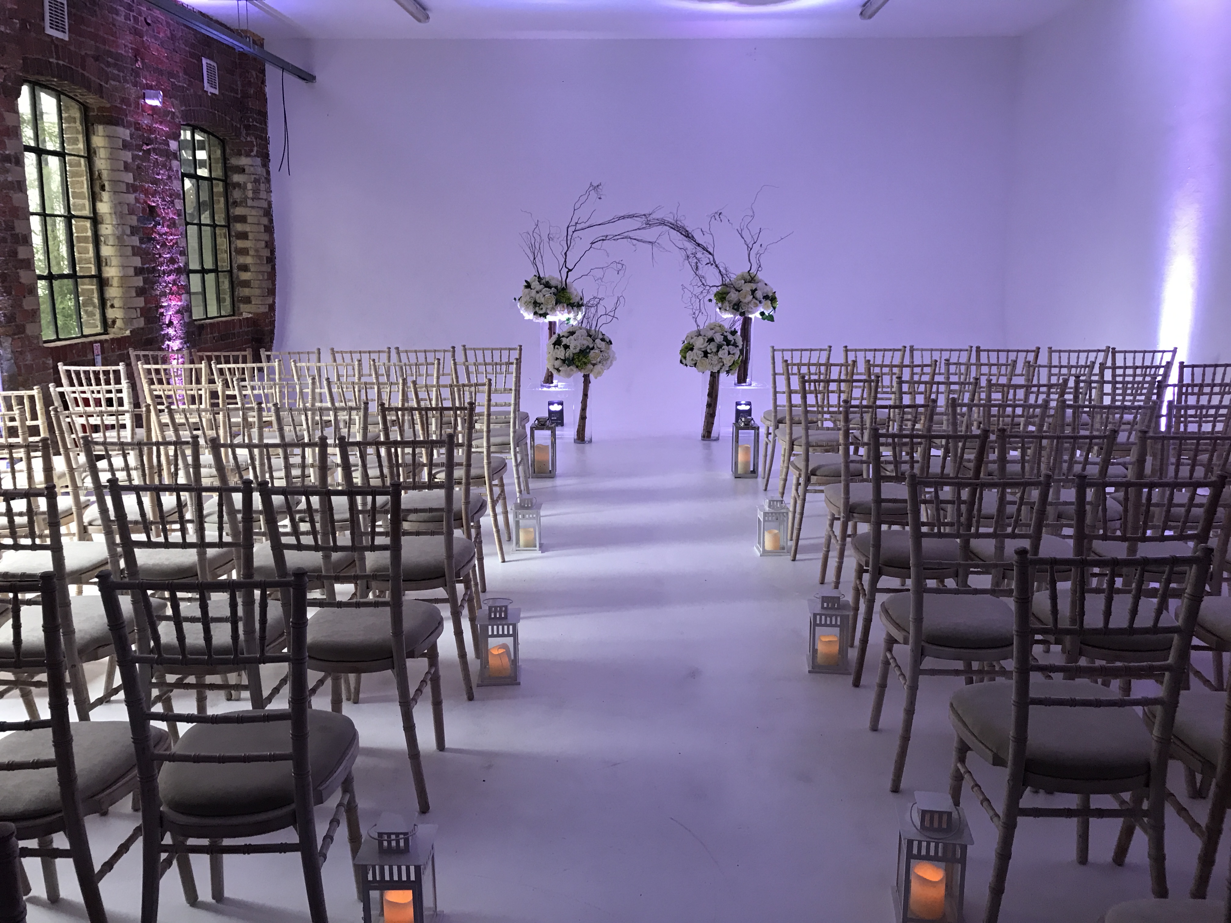 Elegant ceremony space with chiavari chairs, perfect for weddings and formal events.