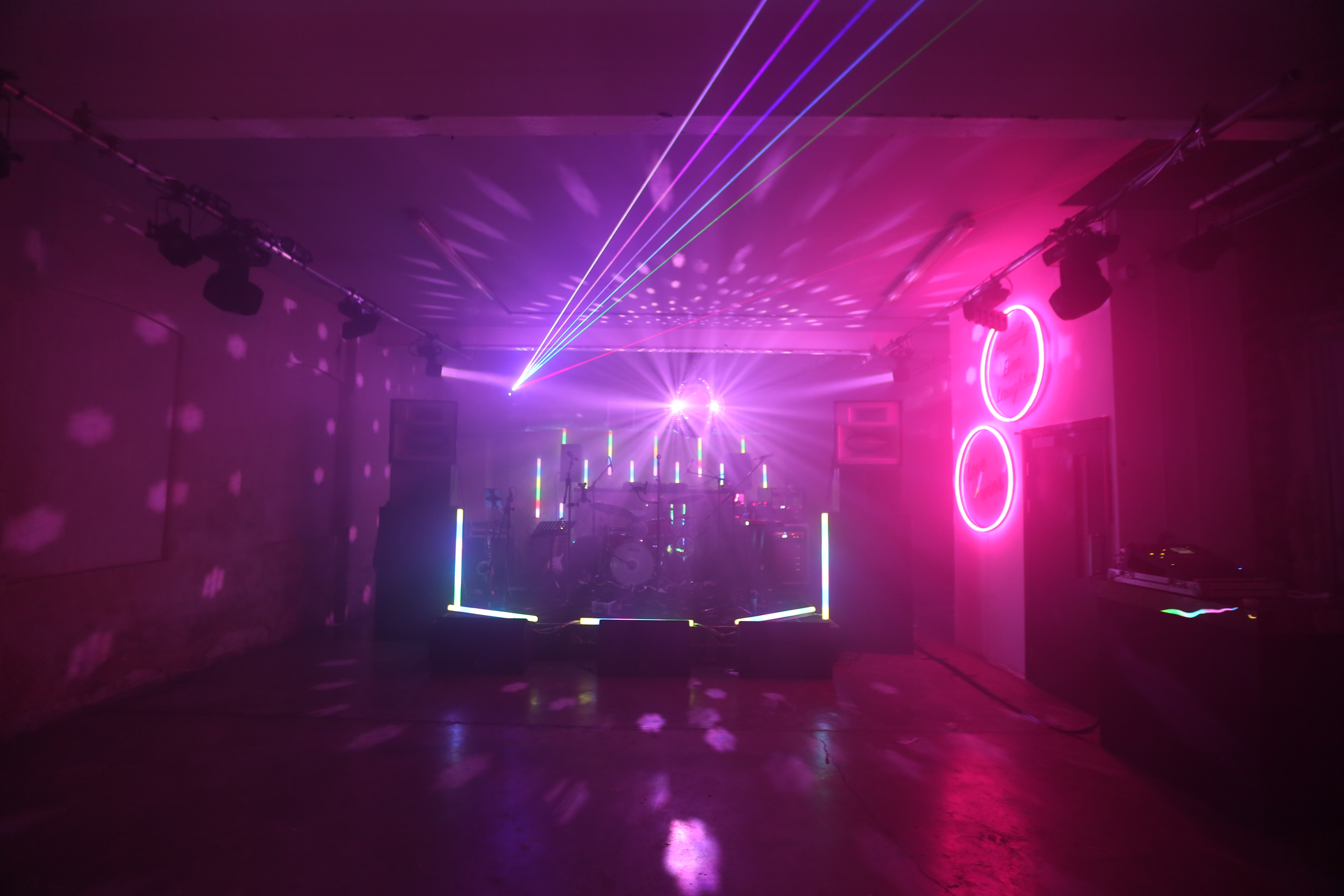 Vibrant Studio 5 event space with dynamic lighting for live performances and dance events.