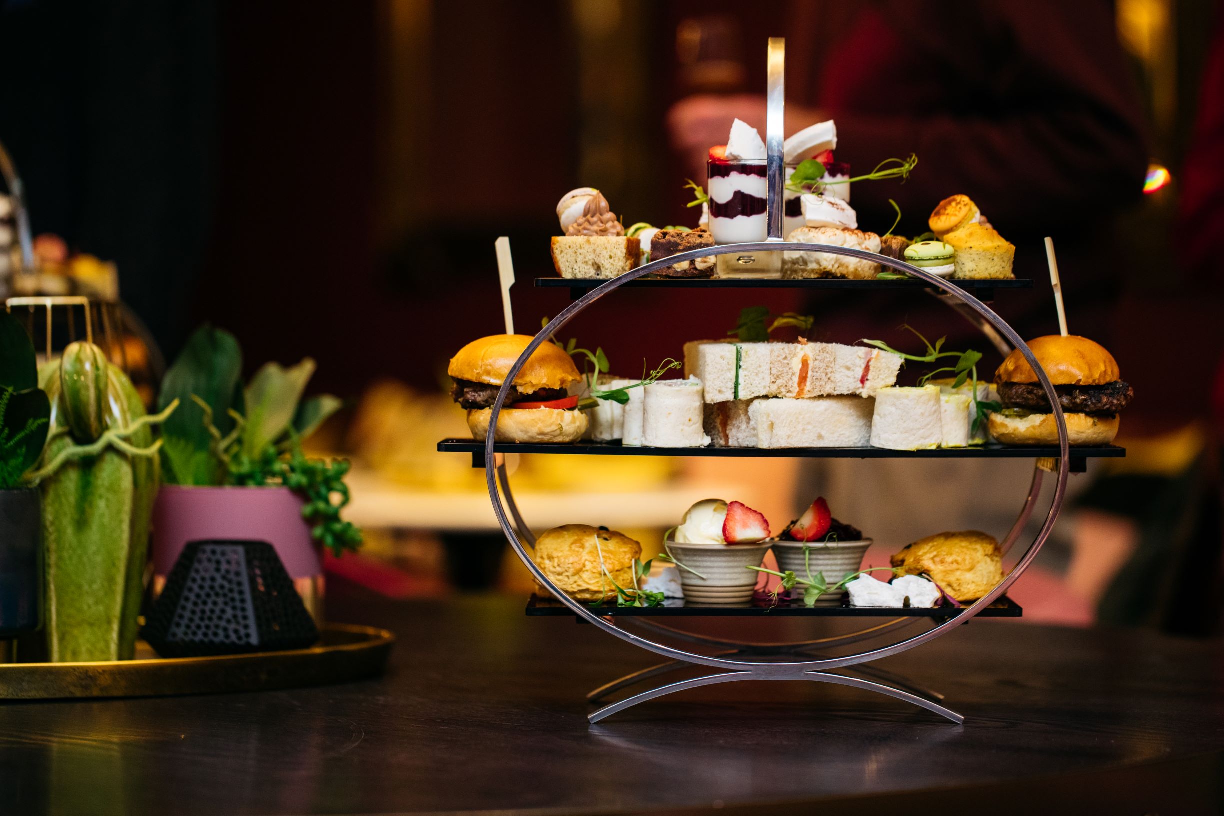 Elegant tiered gourmet bites display for upscale networking events at Aldwyn's.