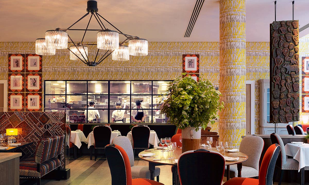 Stylish Windmill Room at Ham Yard Hotel, ideal for corporate dinners and networking events.