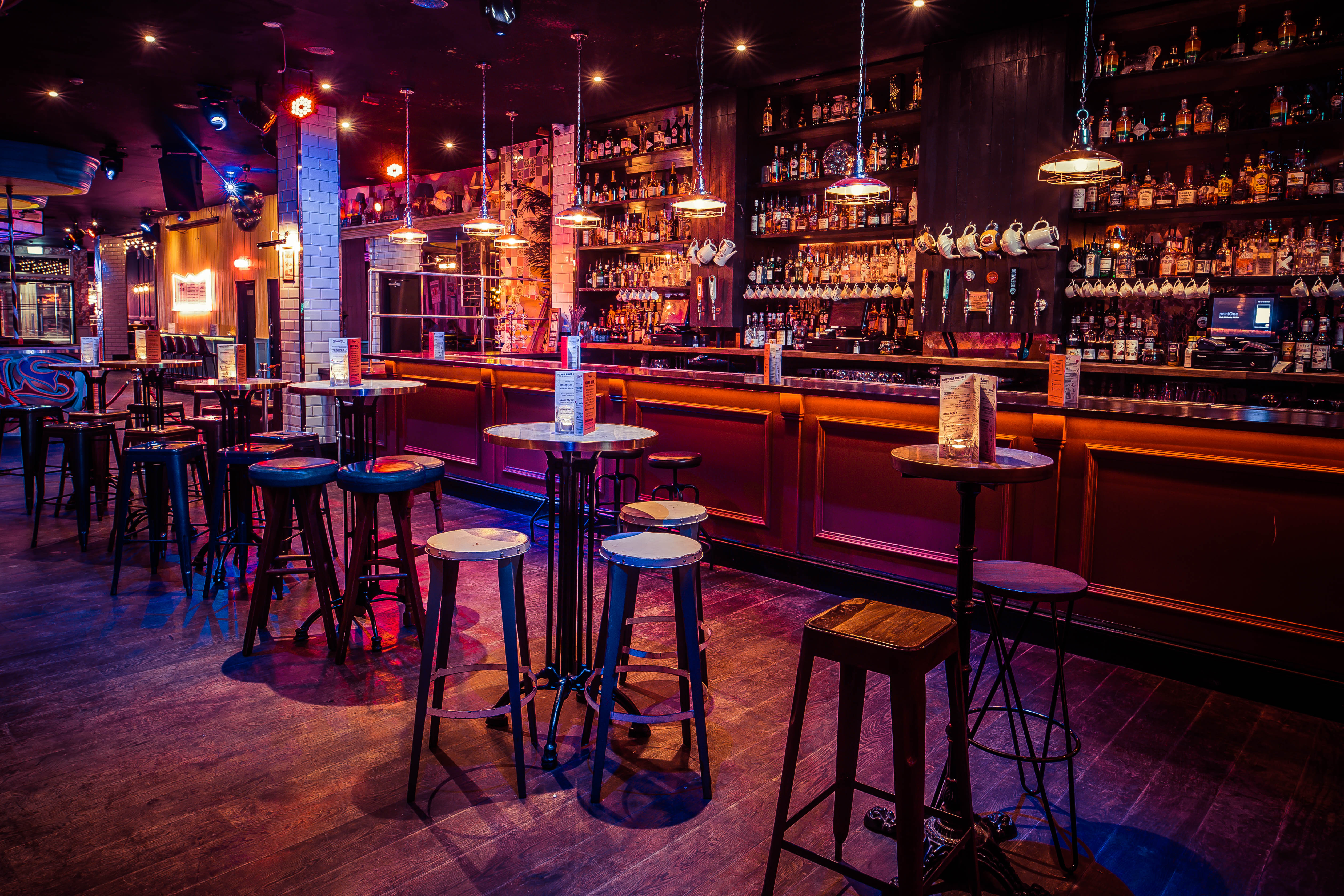 Vibrant semi-private bar space for cocktail receptions and networking events.