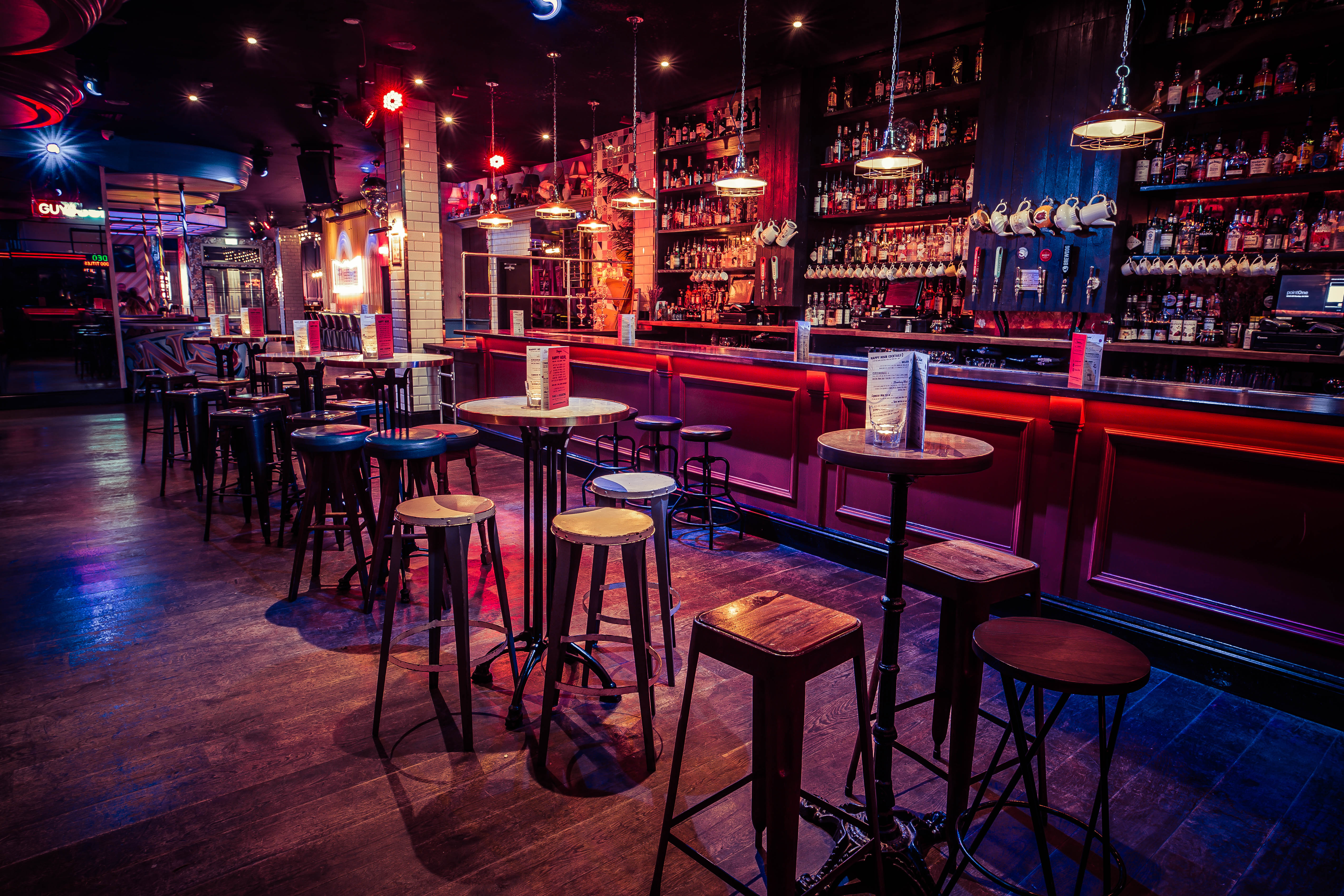 Stylish semi-private bar space for intimate gatherings and networking events.