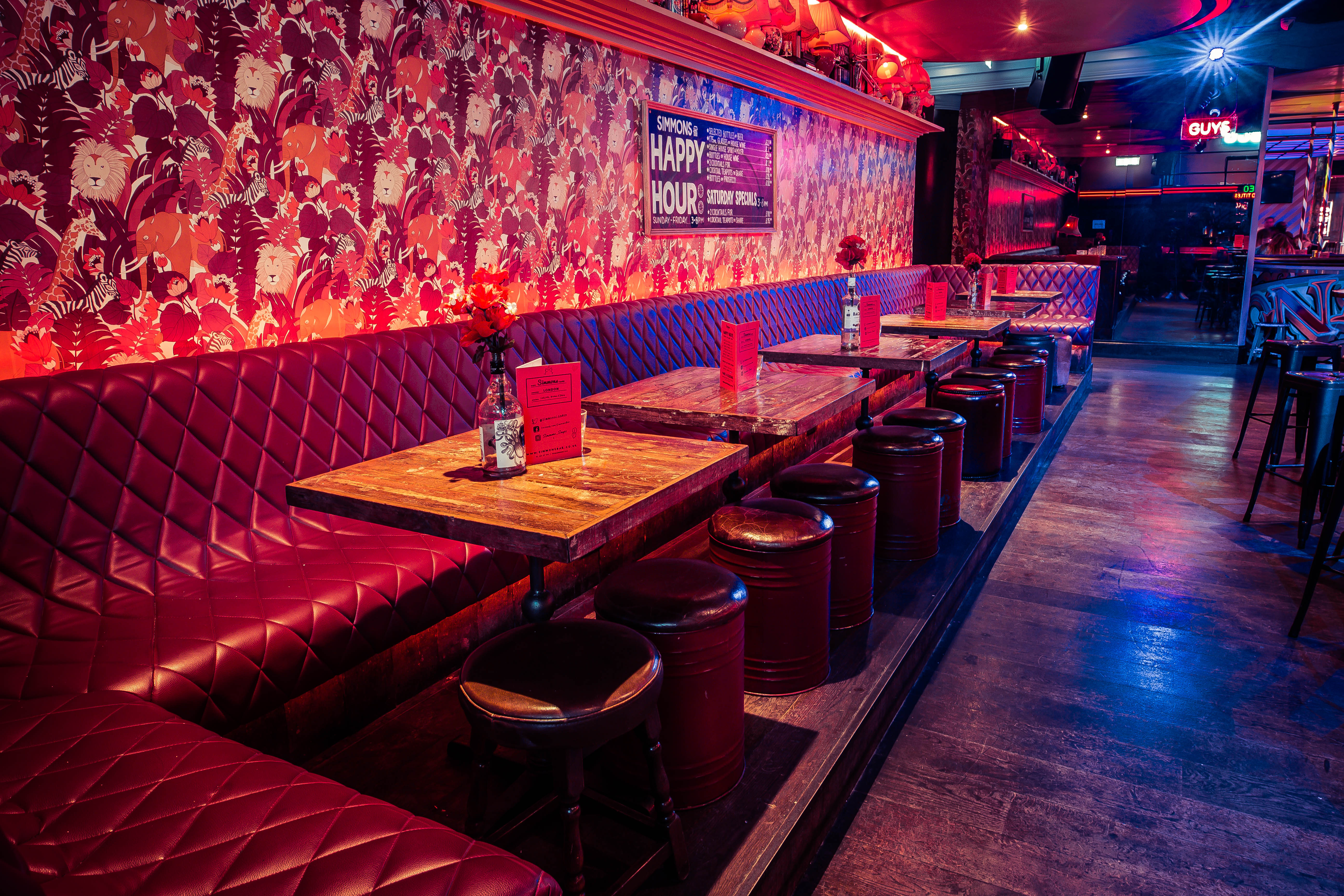 Semi-private venue with plush seating, perfect for casual gatherings and networking events.