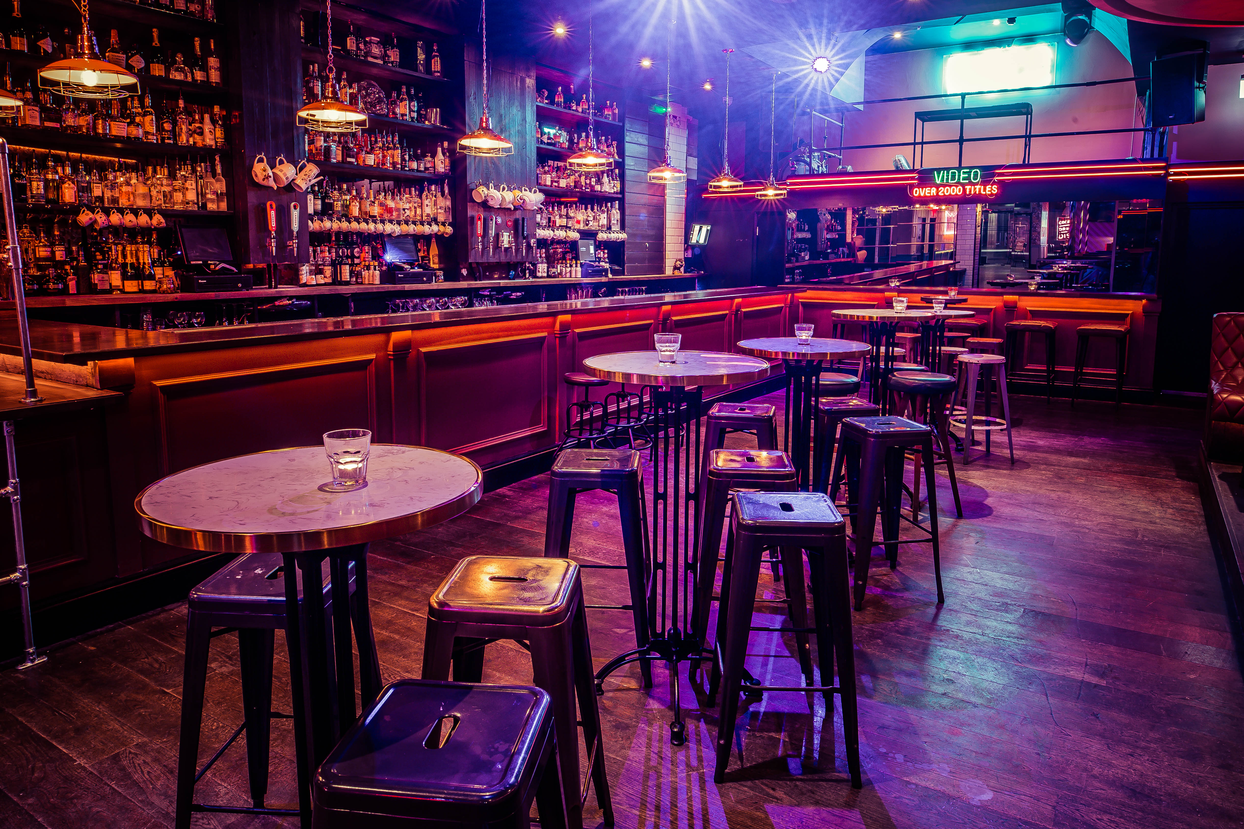 Stylish semi-private bar space for intimate gatherings and networking events.