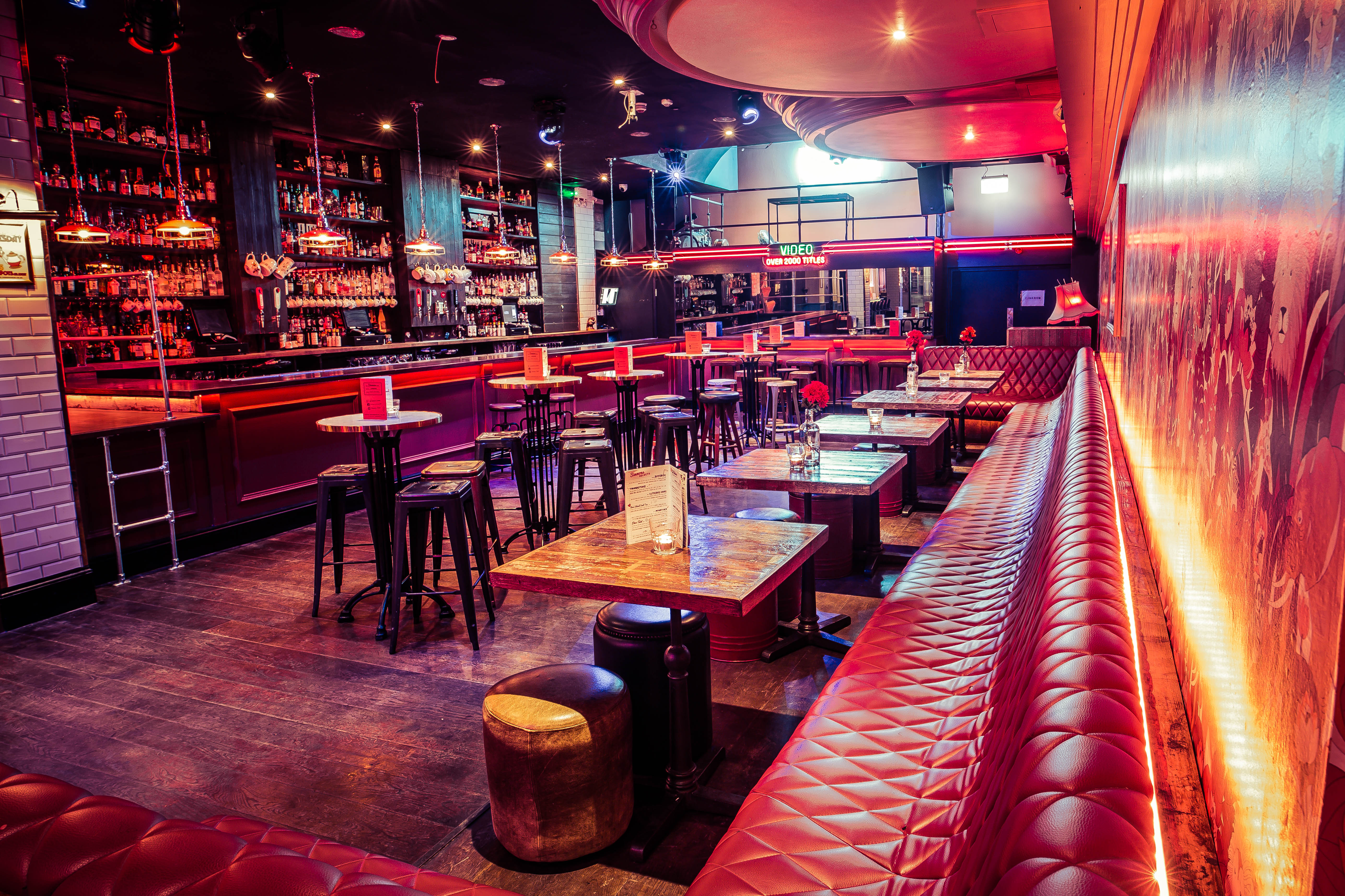 Stylish semi-private venue with plush seating for networking events and cocktail parties.