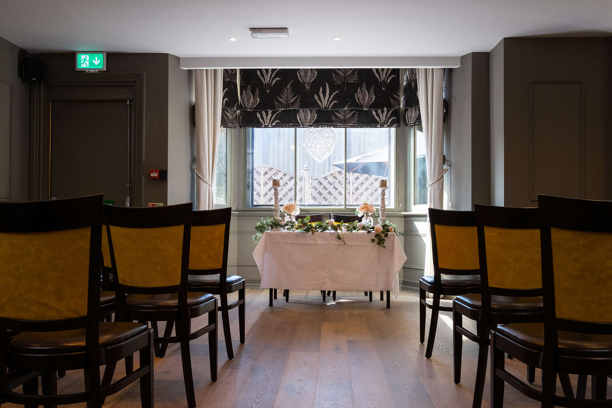 Waterloo Suite meeting space with semi-circle seating, ideal for workshops and gatherings.