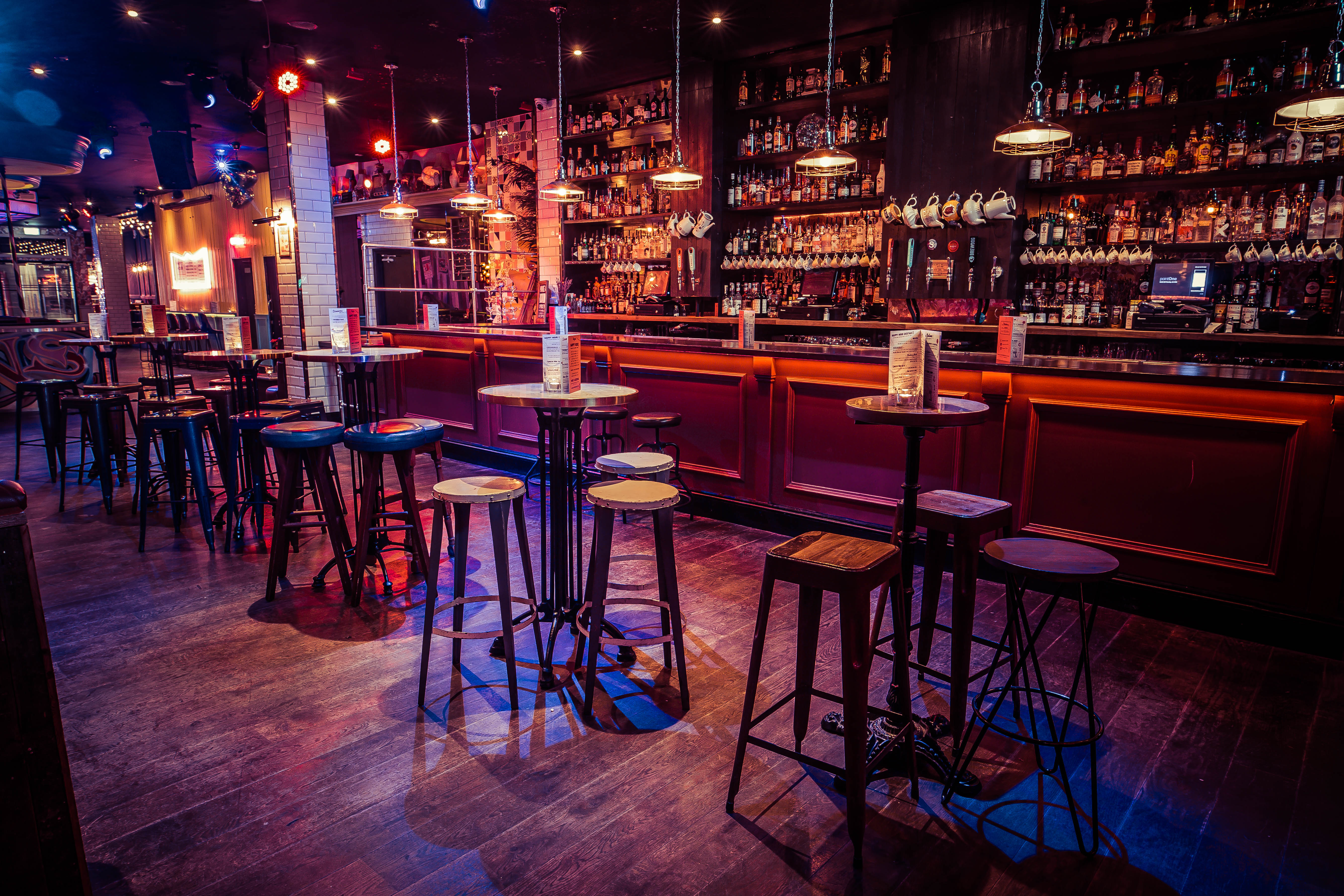 Stylish bar venue with modern decor, ideal for networking events and cocktail receptions.