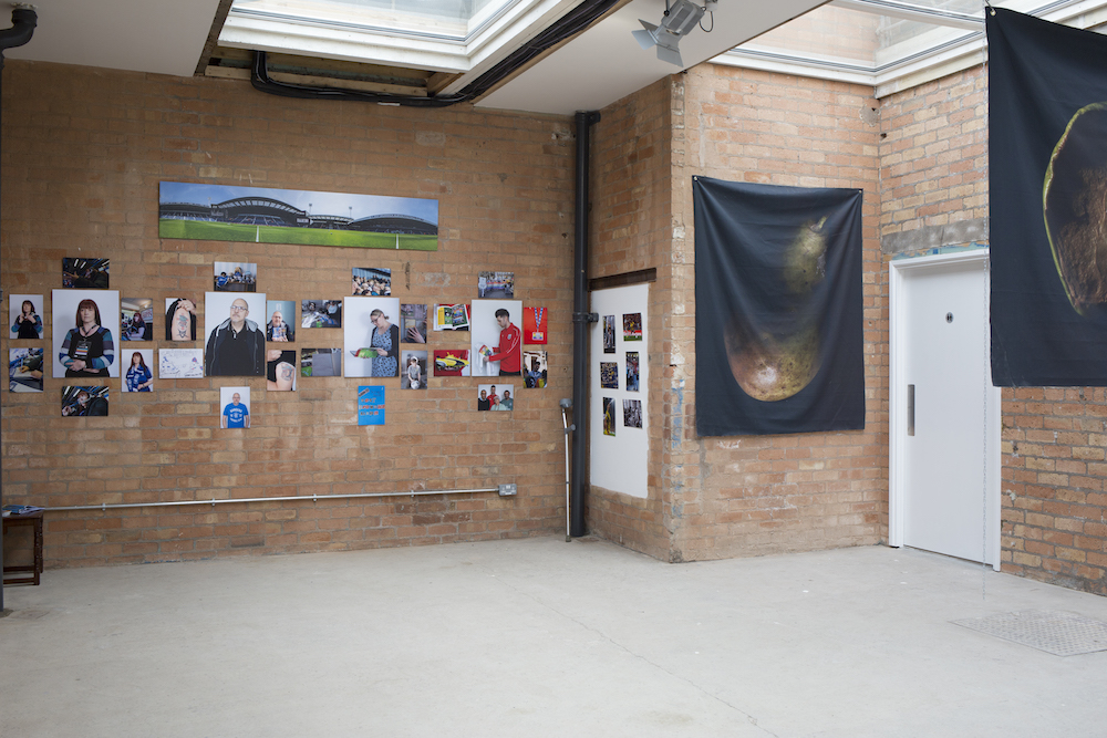 Versatile event space with exposed brick walls, ideal for art exhibitions and workshops.