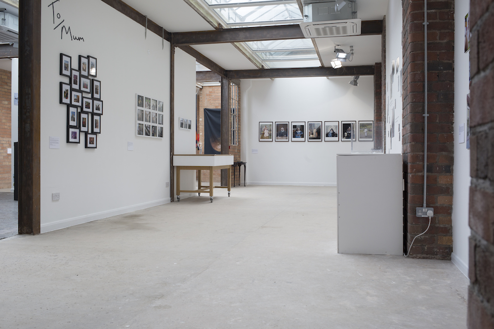 Versatile event space in Iron House with minimalist design for art exhibitions and meetings.