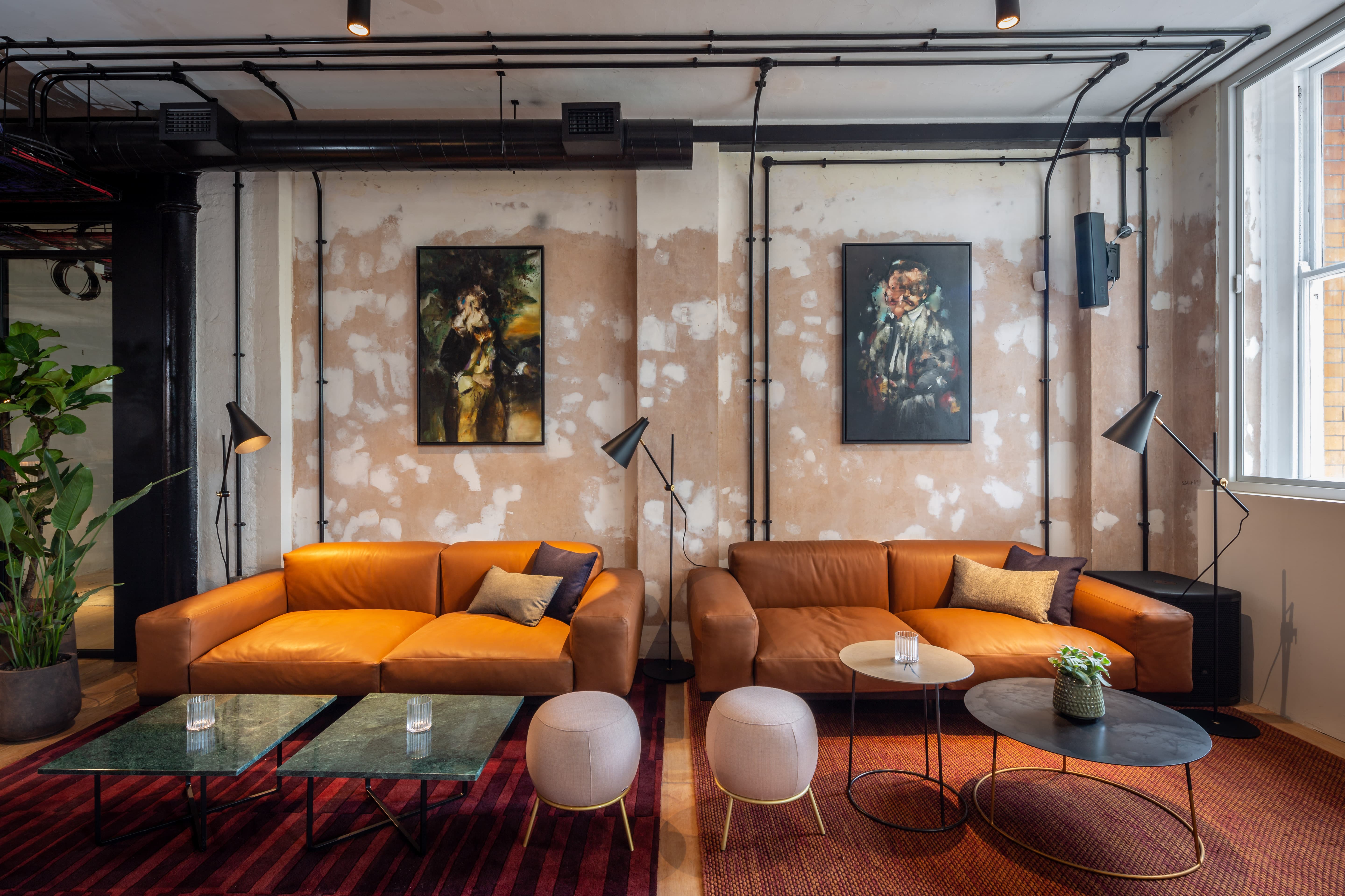 Industrial-chic lounge at The Ministry, ideal for corporate retreats and networking events.