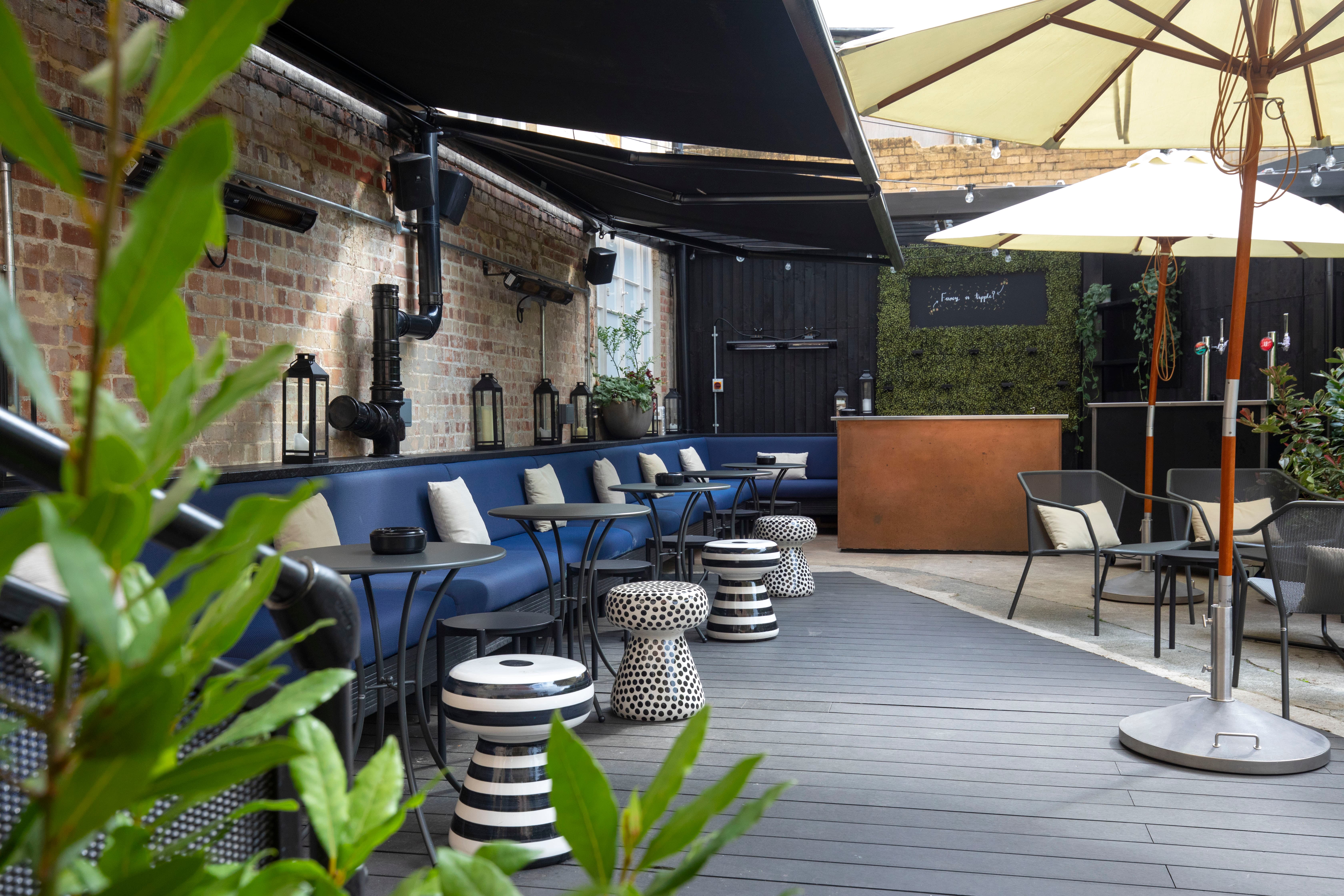 Outdoor terrace bar at The Ministry for high-end networking receptions and corporate events.