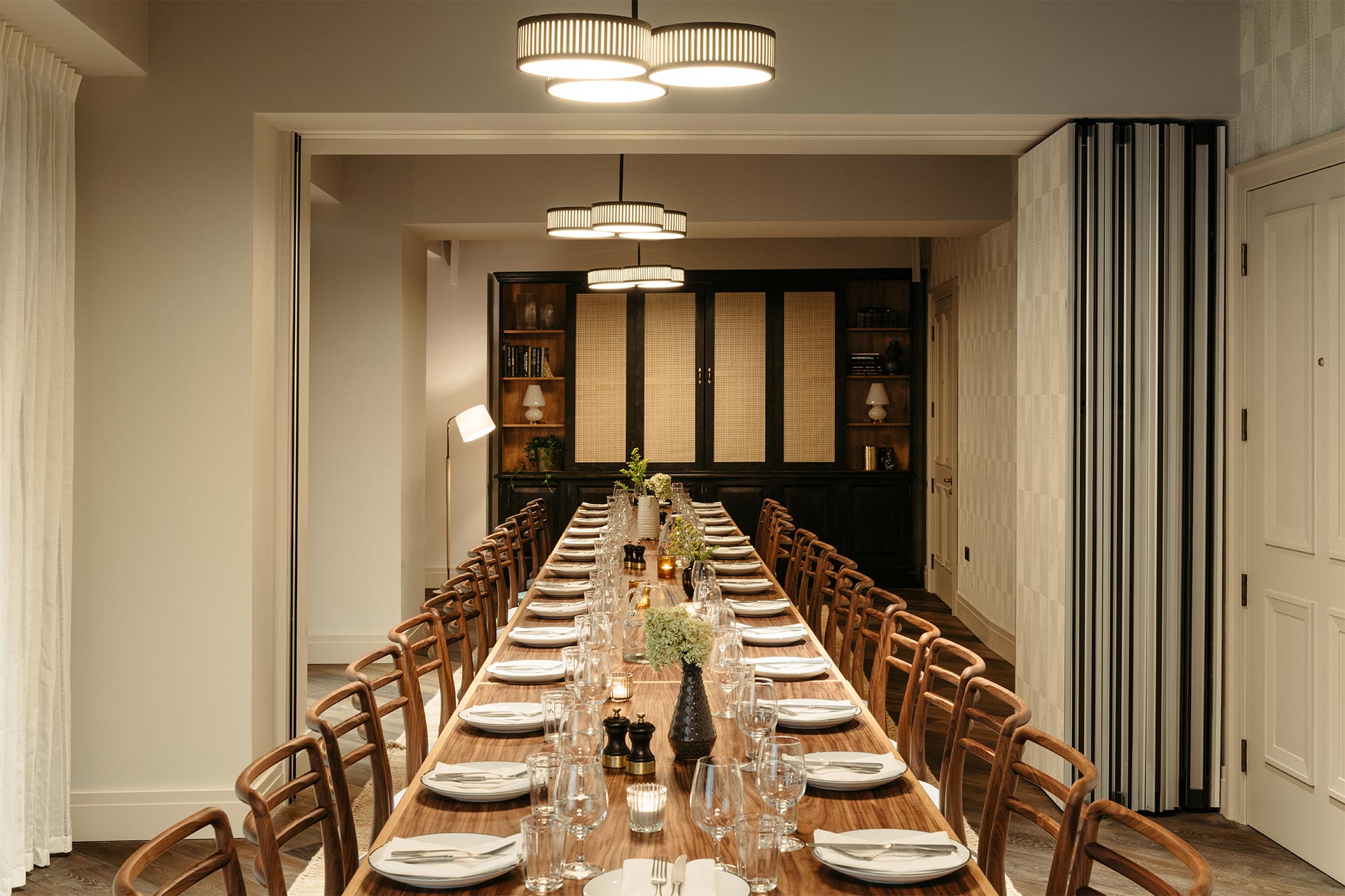 Elegant long dining table setup for corporate dinners at The Hoxton Southwark.