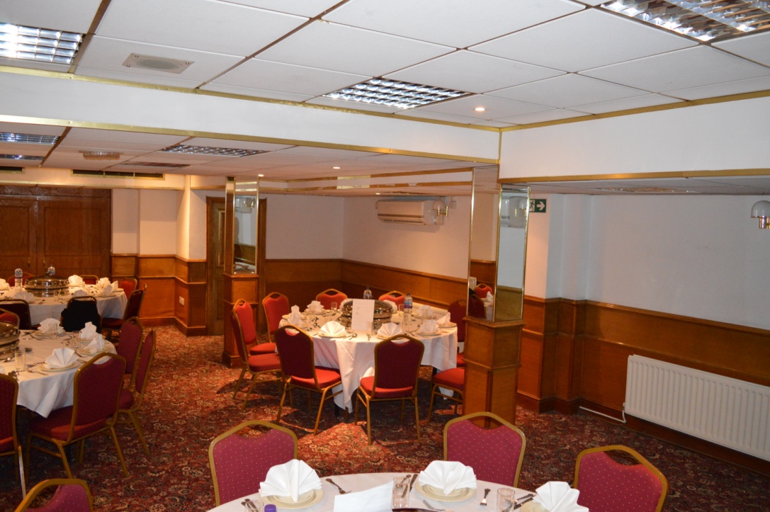 Private dining room at Lagenda Restaurant, elegantly set for corporate events and gatherings.