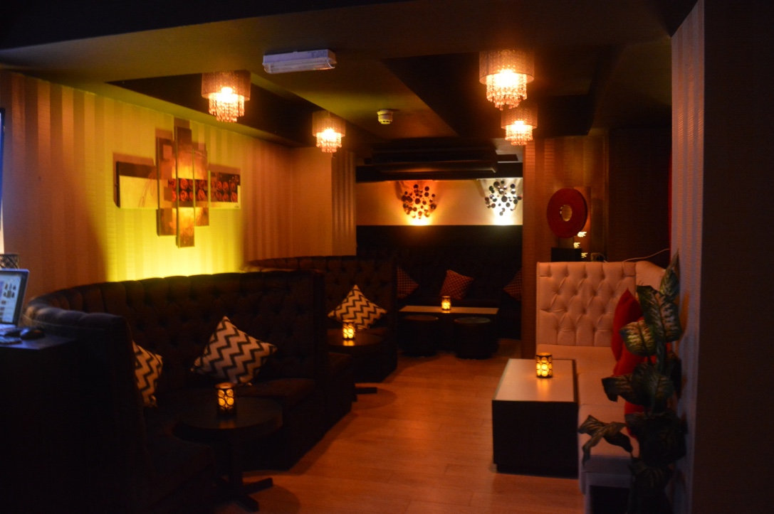 Stylish lounge bar with plush seating, perfect for networking events and gatherings.