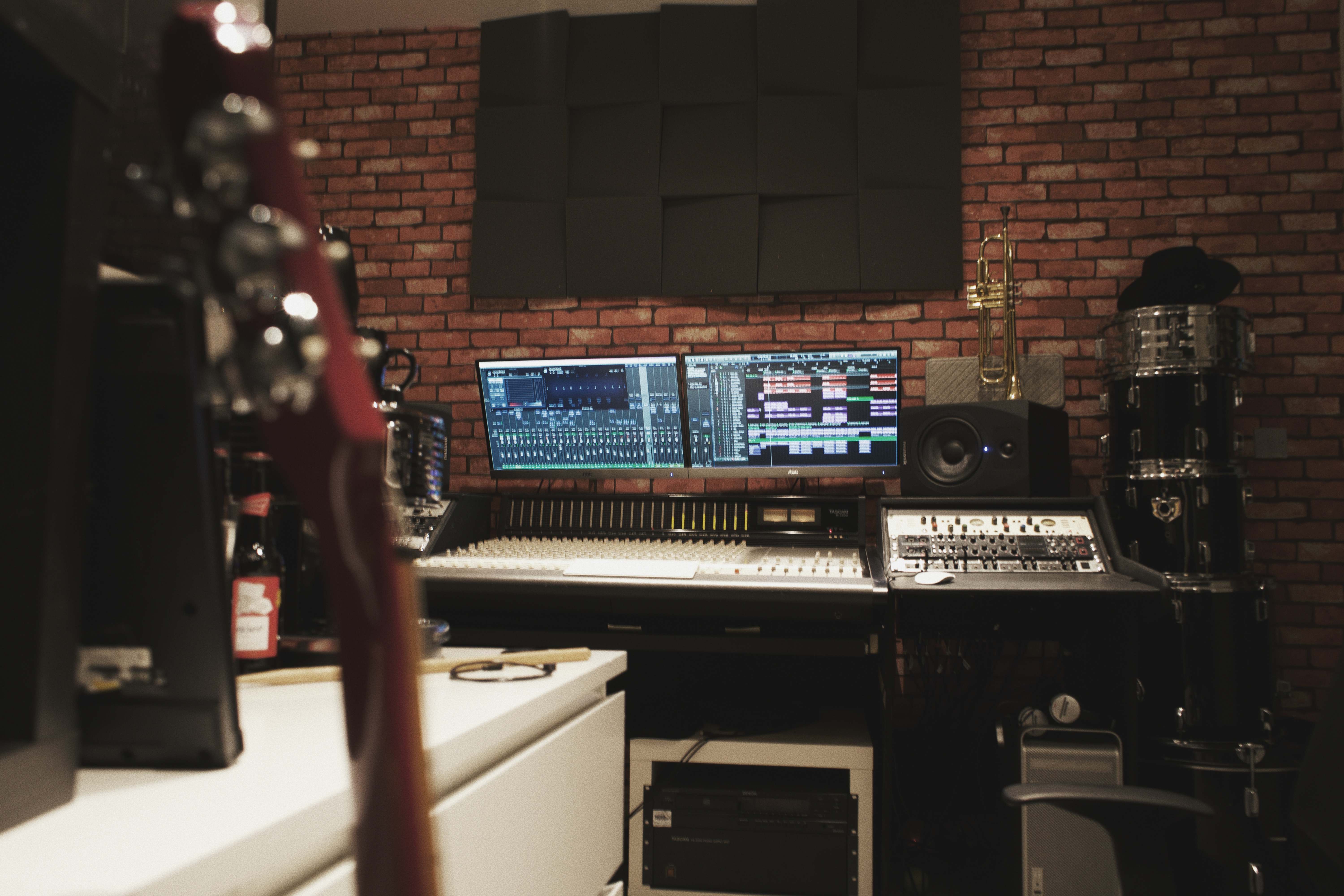 Modern recording studio with dual monitors, perfect for music production workshops.