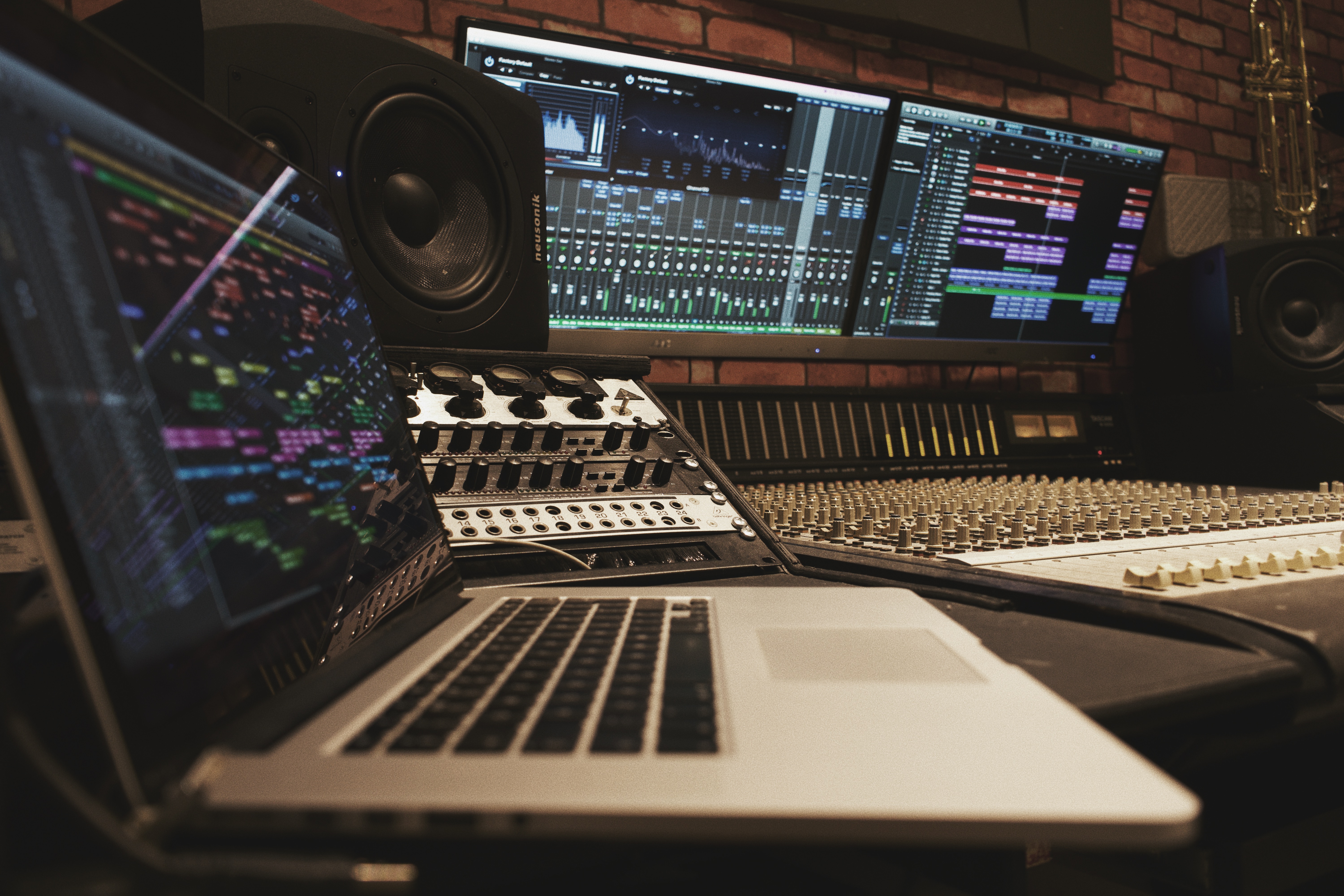 Modern audio production setup with mixing console for events and presentations.