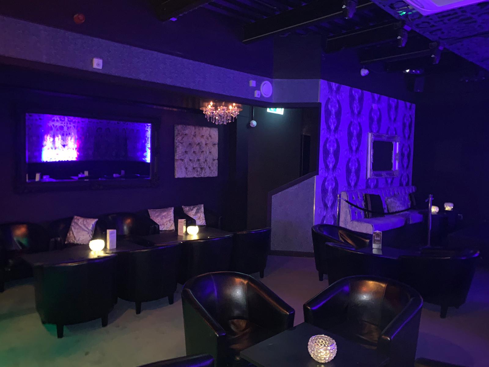 Stylish event space at Black Diamond Gentleman's Club with plush seating for upscale gatherings.