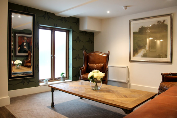 Stylish meeting space in Mythe Barn with elegant seating for collaborative discussions.