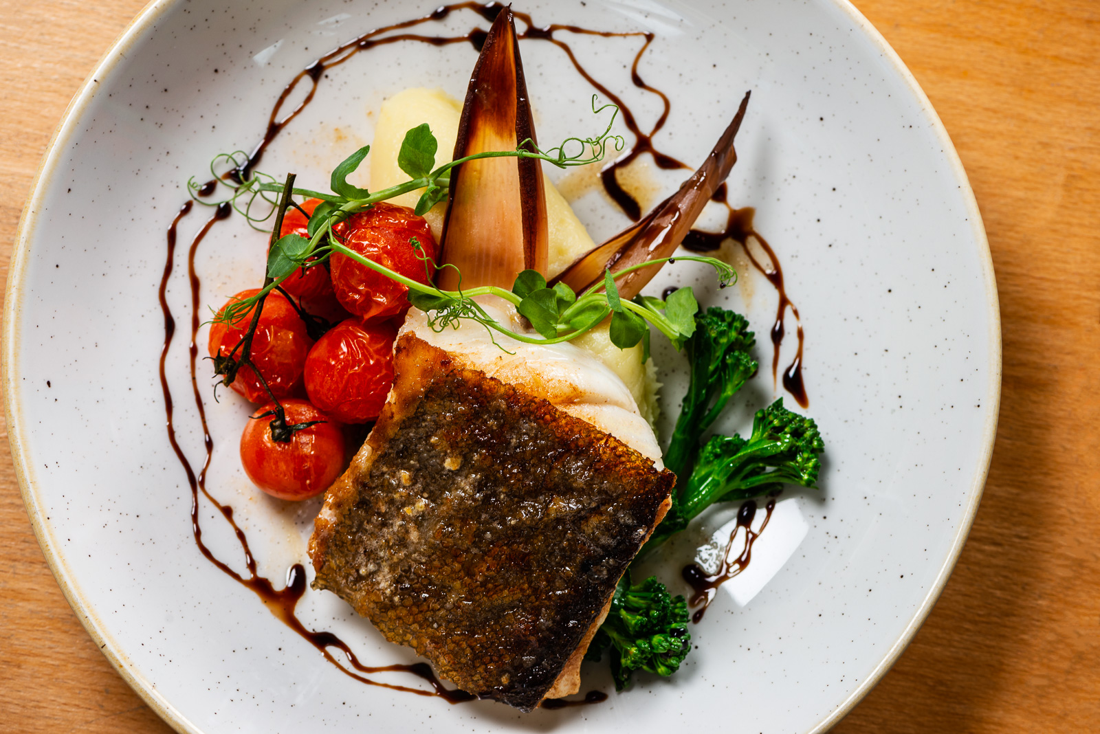 Crispy-skinned fish dish at The Treehouse, perfect for upscale events and gala dinners.