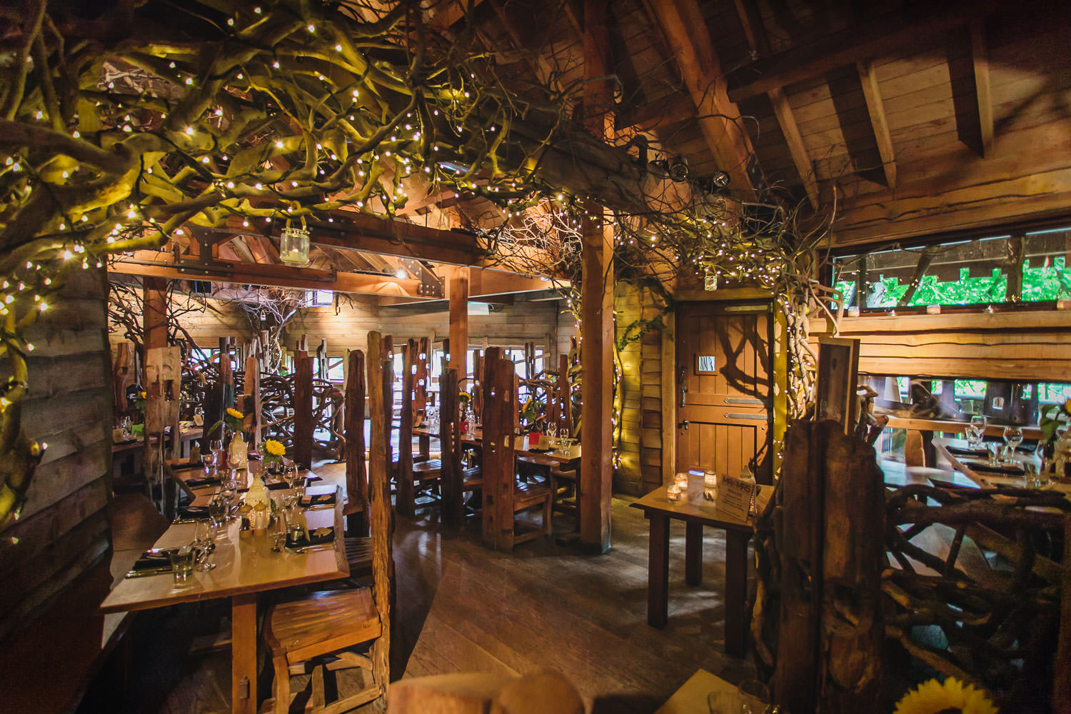 Rustic dining space in The Treehouse, Alnwick Garden for intimate events and gatherings.