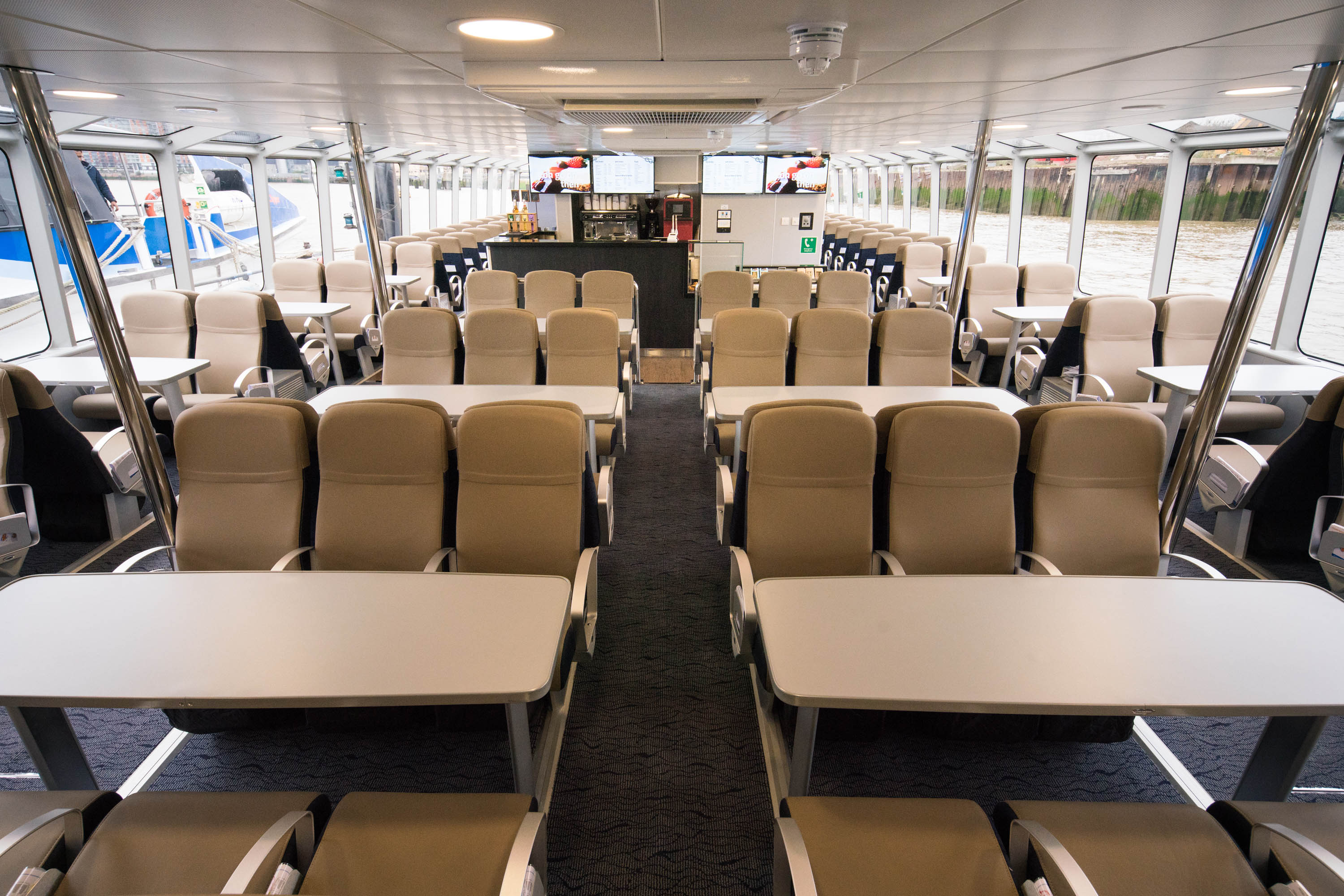 Modern event space on Venus Clipper with scenic views for corporate meetings at sea.